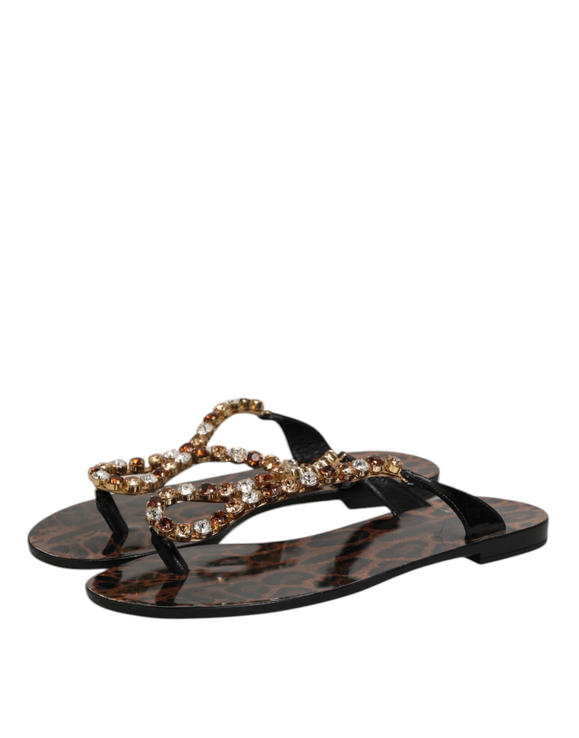 Sandales plates Dolce & Gabbana noires avec cristaux, chaussures d'été pour la plage, style élégant et confortable.