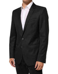 Manteau pour homme Dolce & Gabbana noir, blazer à un bouton, coupe classique, porté sur un mannequin.