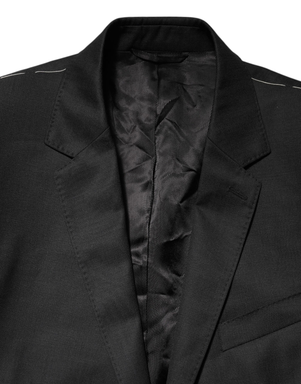 Manteau pour homme Dolce & Gabbana noir à un seul bouton, blazer Martini élégant, en tissu classique, porté sur un mannequin.