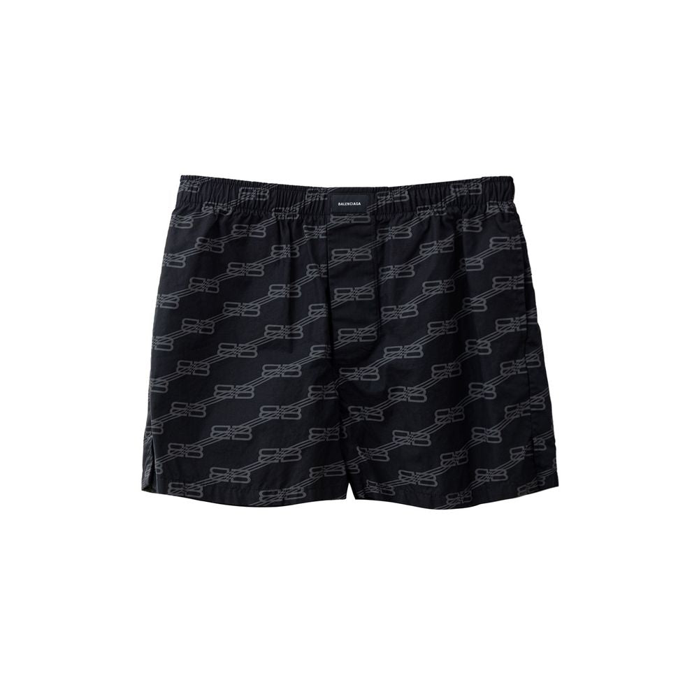 Shorts bermuda en coton noir de Balenciaga, style décontracté avec coupe tendance, visibles avec détails de couture.