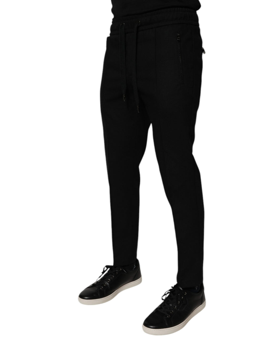 Pantalon jogging homme Dolce & Gabbana en laine noire, coupe skinny, style décontracté et élégant, visible en gros plan.