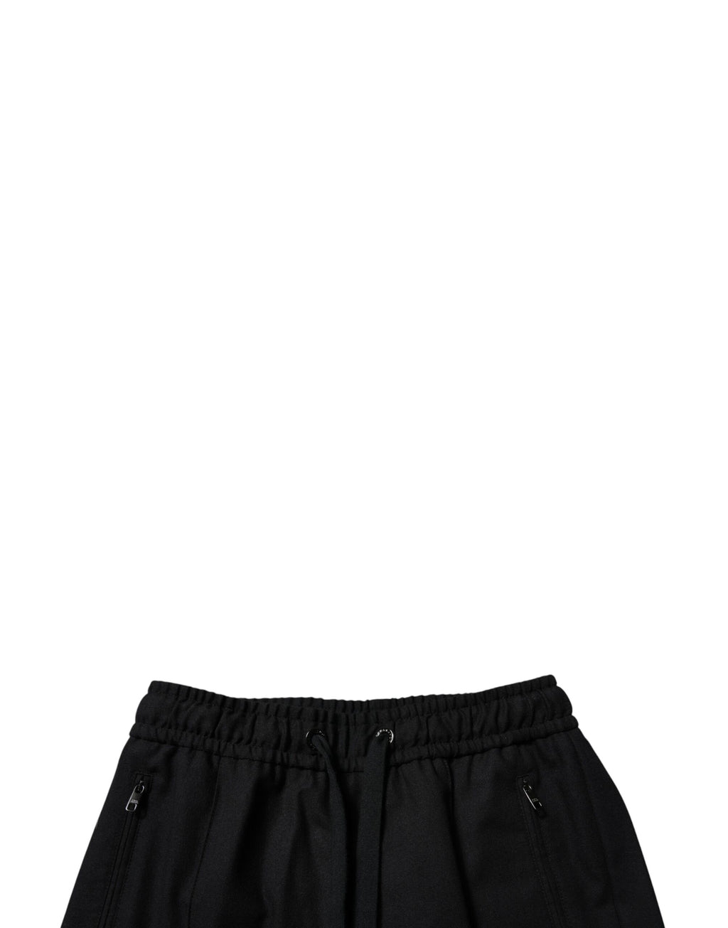 Pantalon jogger skinny en laine noire pour homme de Dolce & Gabbana, ajusté et élégant, visible en gros plan.