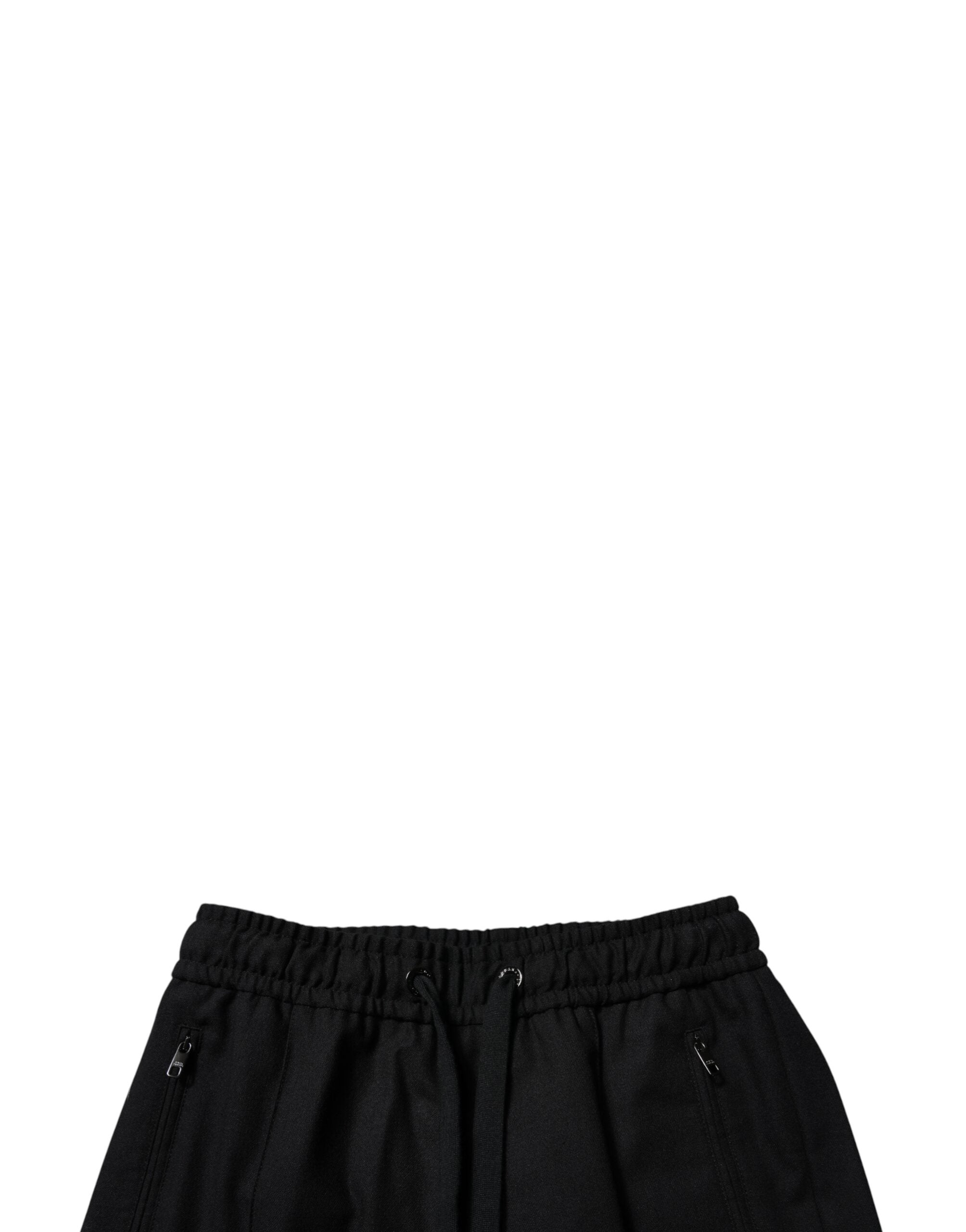 Pantalon jogger skinny en laine noire pour homme de Dolce & Gabbana, ajusté et élégant, visible en gros plan.