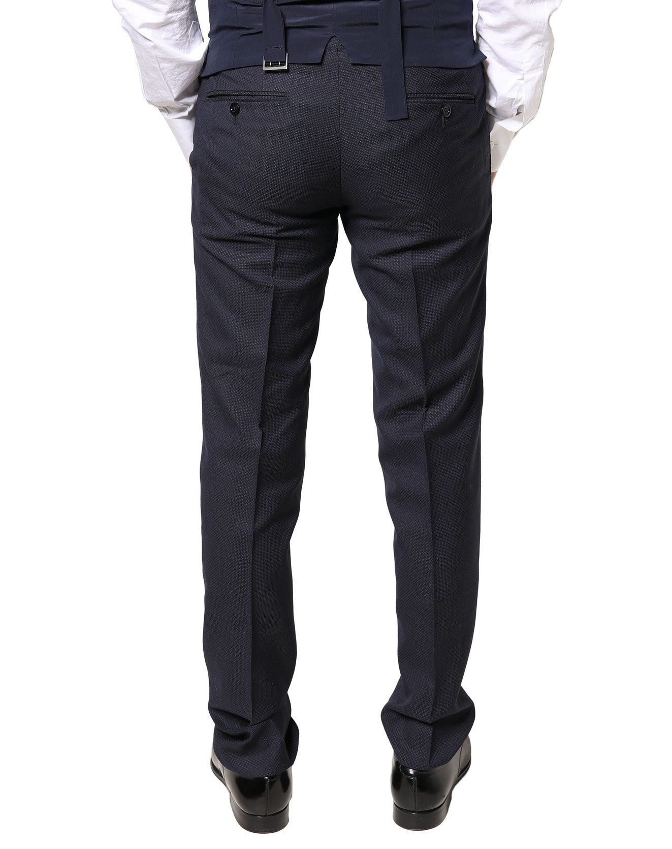 Pantalon formel en laine grise de Dolce & Gabbana pour homme, élégant et ajusté, parfait pour occasions habillées.
