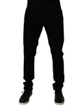Jeans pour homme Dolce & Gabbana en coton stretch noir, coupe skinny, style denim, visible sur le produit.