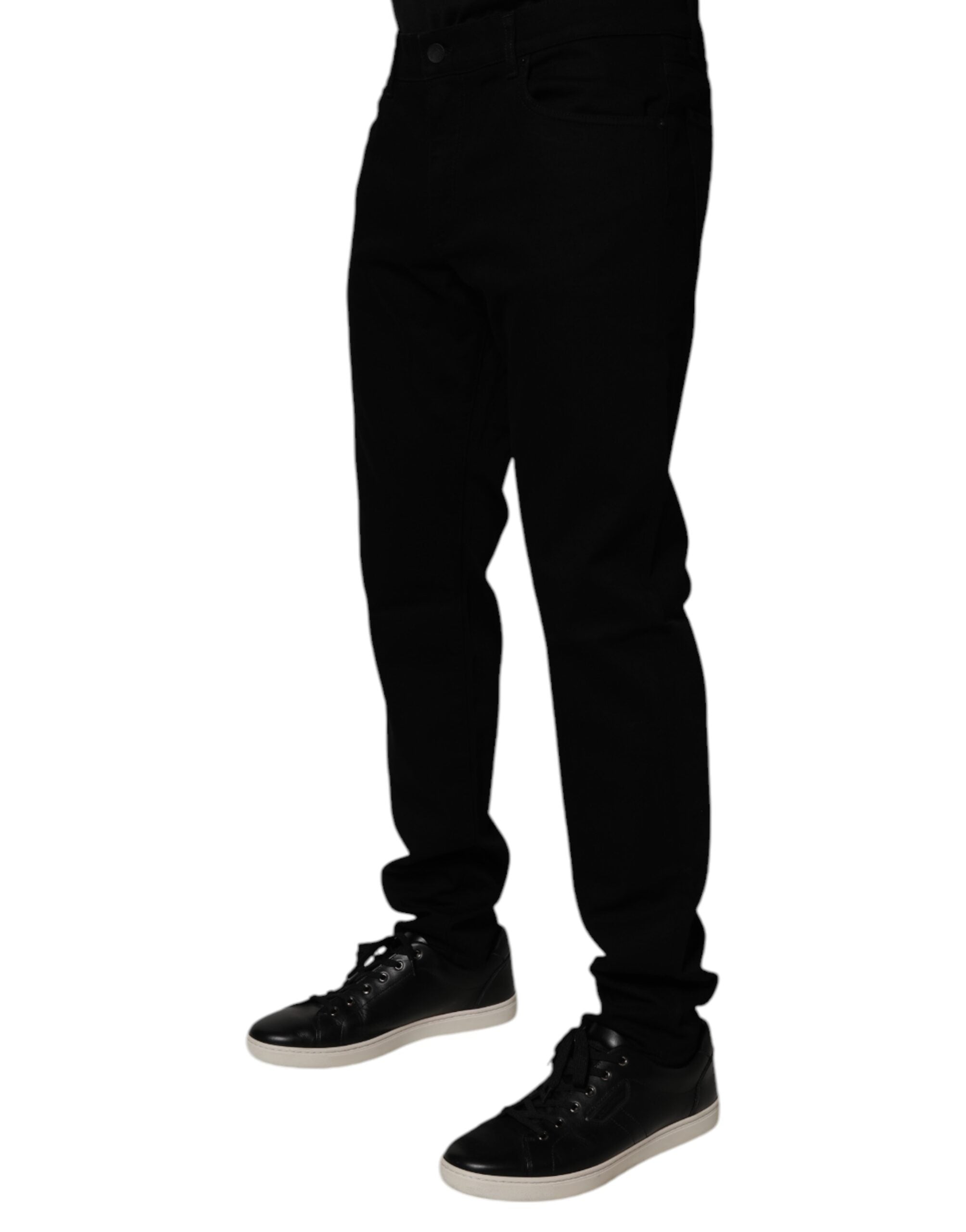 Jeans slim en coton stretch noir pour homme de Dolce & Gabbana, coupe skinny, visible détail de la matière et de la couture.