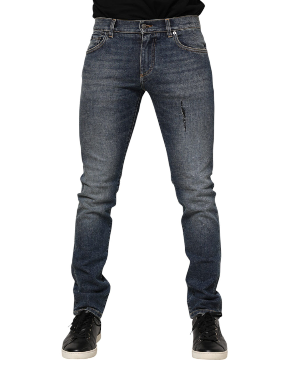 Jean homme skinny en denim blanc lavé Dolce & Gabbana, coupe ajustée, détails classiques et fermeture éclair visible.
