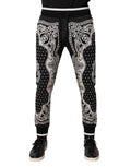 Pantalon jogger Dolce & Gabbana en coton noir avec bandeau, style décontracté et confortable, vue de face.