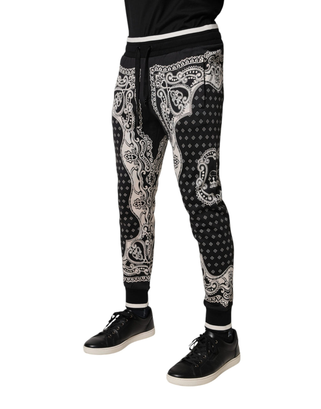 Pantalon jogger Dolce & Gabbana en coton noir avec bandeau, style décontracté et confort, vue de face.
