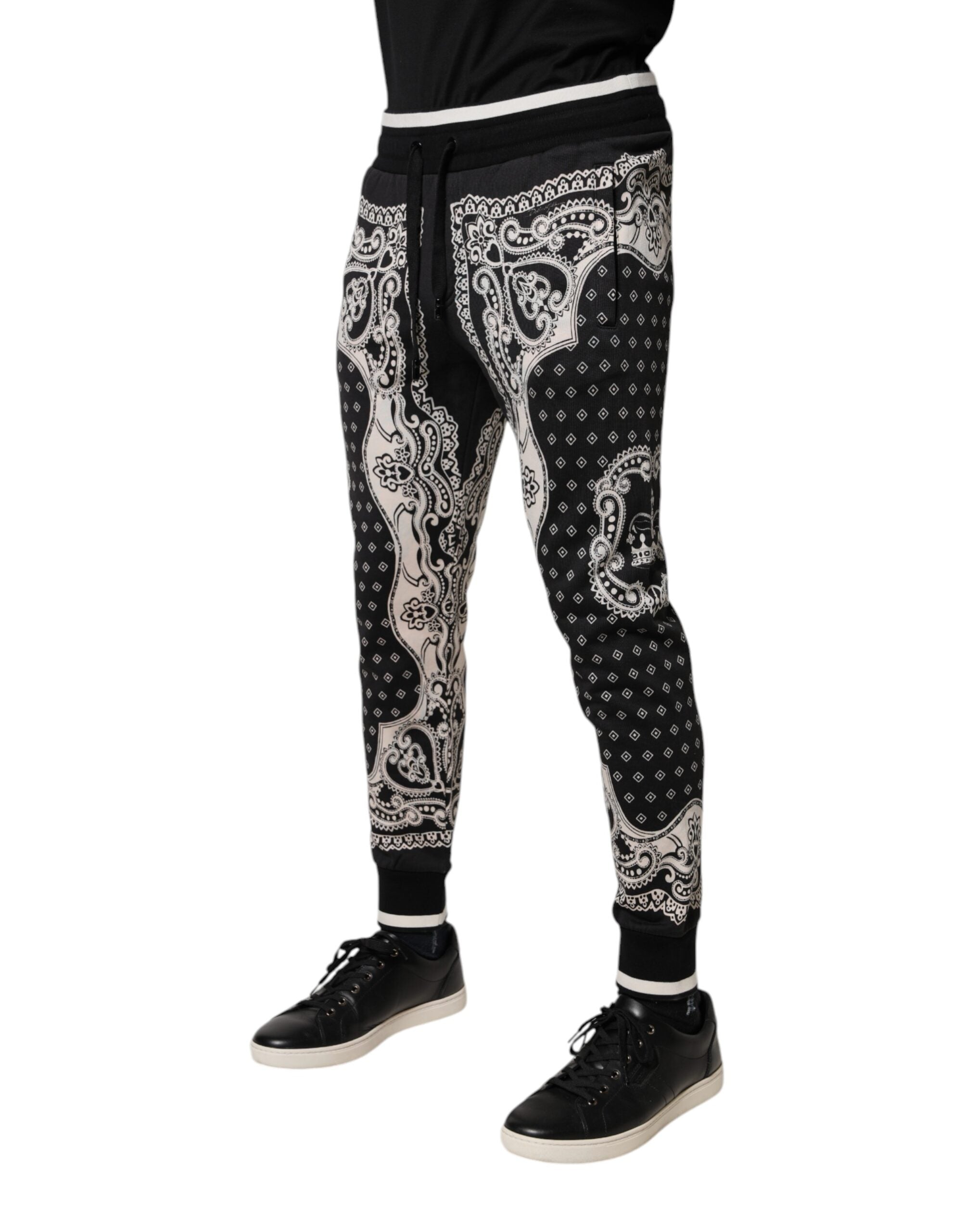 Pantalon jogger Dolce & Gabbana en coton noir avec bandeau, style décontracté et confort, vue de face.