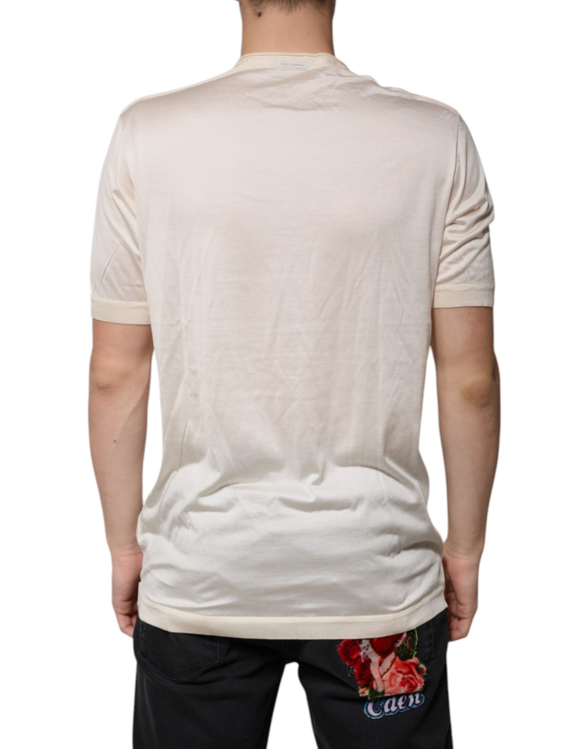 T-shirt en soie blanche Dolce & Gabbana à manches courtes Henley, élégante et légère, vue de face.