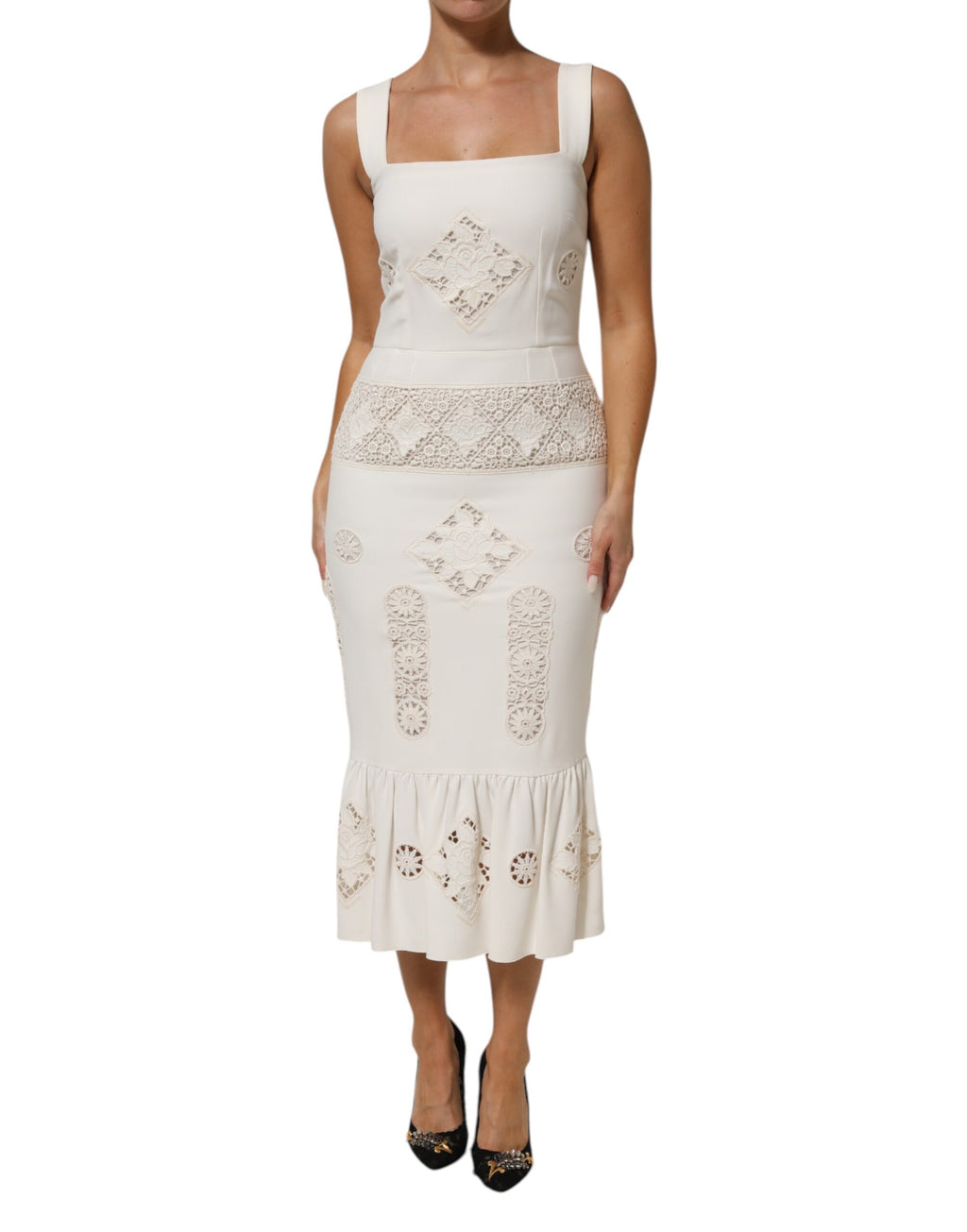 Robe midi sans manches Dolce & Gabbana en dentelle blanche avec motifs floraux, élégante et sophistiquée.