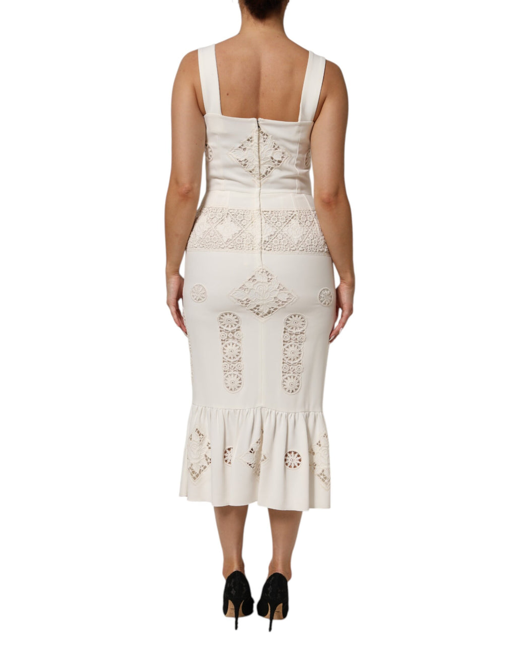 Robe midi sans manches Dolce & Gabbana en dentelle blanche à motifs floraux, élégance raffinée et détails délicats visible sur l'image.