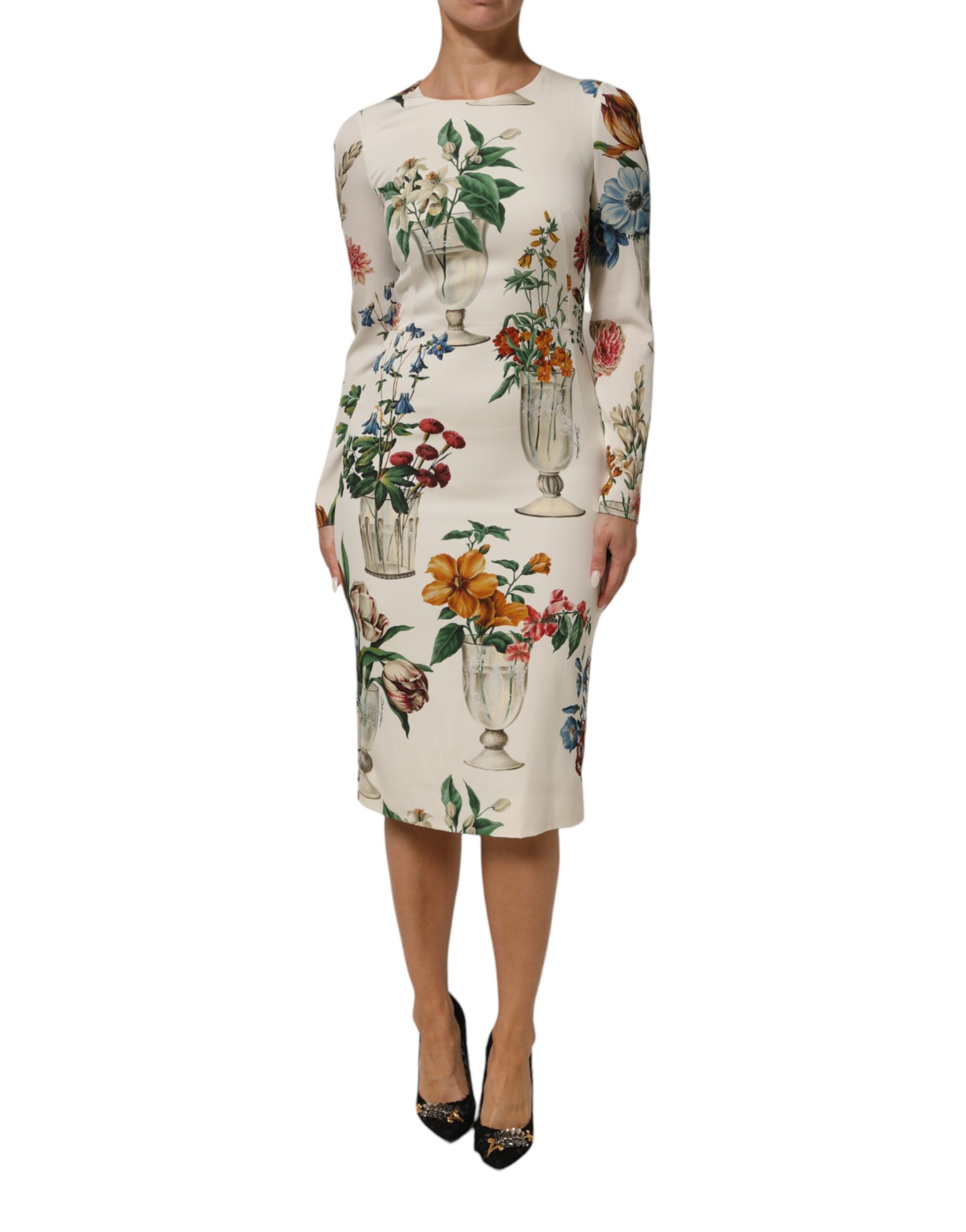 Robe midi en soie blanche Dolce & Gabbana avec motif floral, coupe ajustée et élégante.