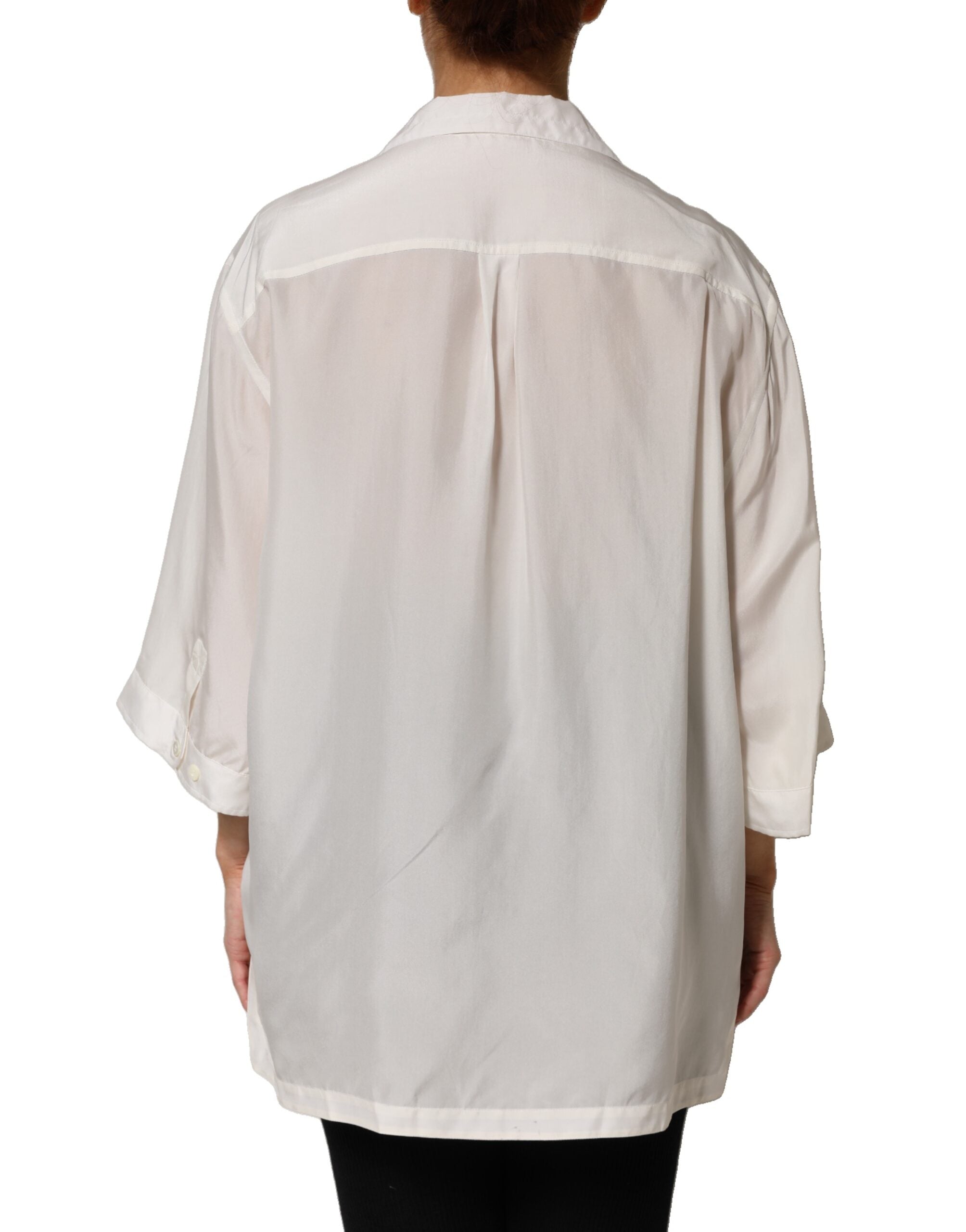 Chemise Polo Dolce & Gabbana en soie blanche avec boutons, élégante et légère pour un style sophistiqué.