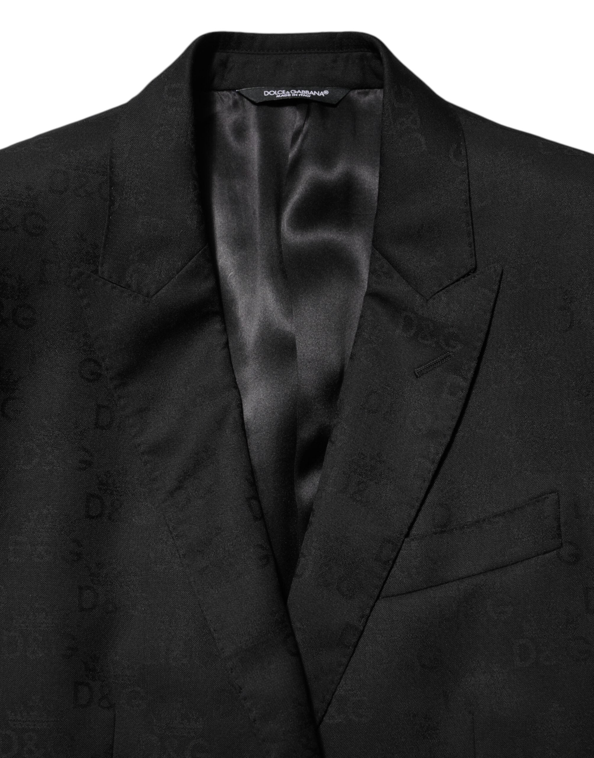 Veste blazer noire Dolce & Gabbana Martini à deux boutons, élégante et sophistiquée, visible en gros plan.