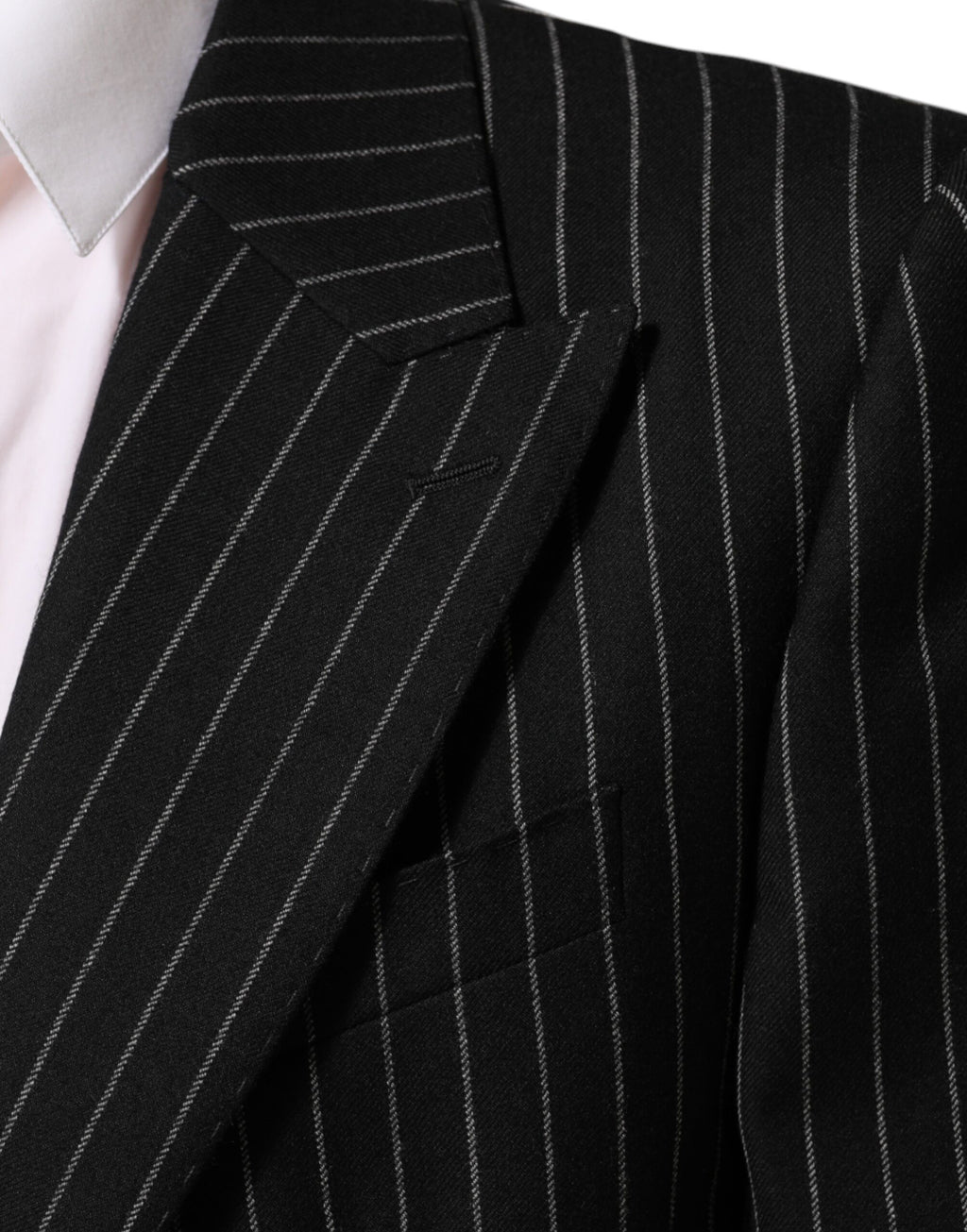 Veste blazer Dolce & Gabbana à rayures noires avec deux boutons, élégante et adaptée pour un style sophistiqué.
