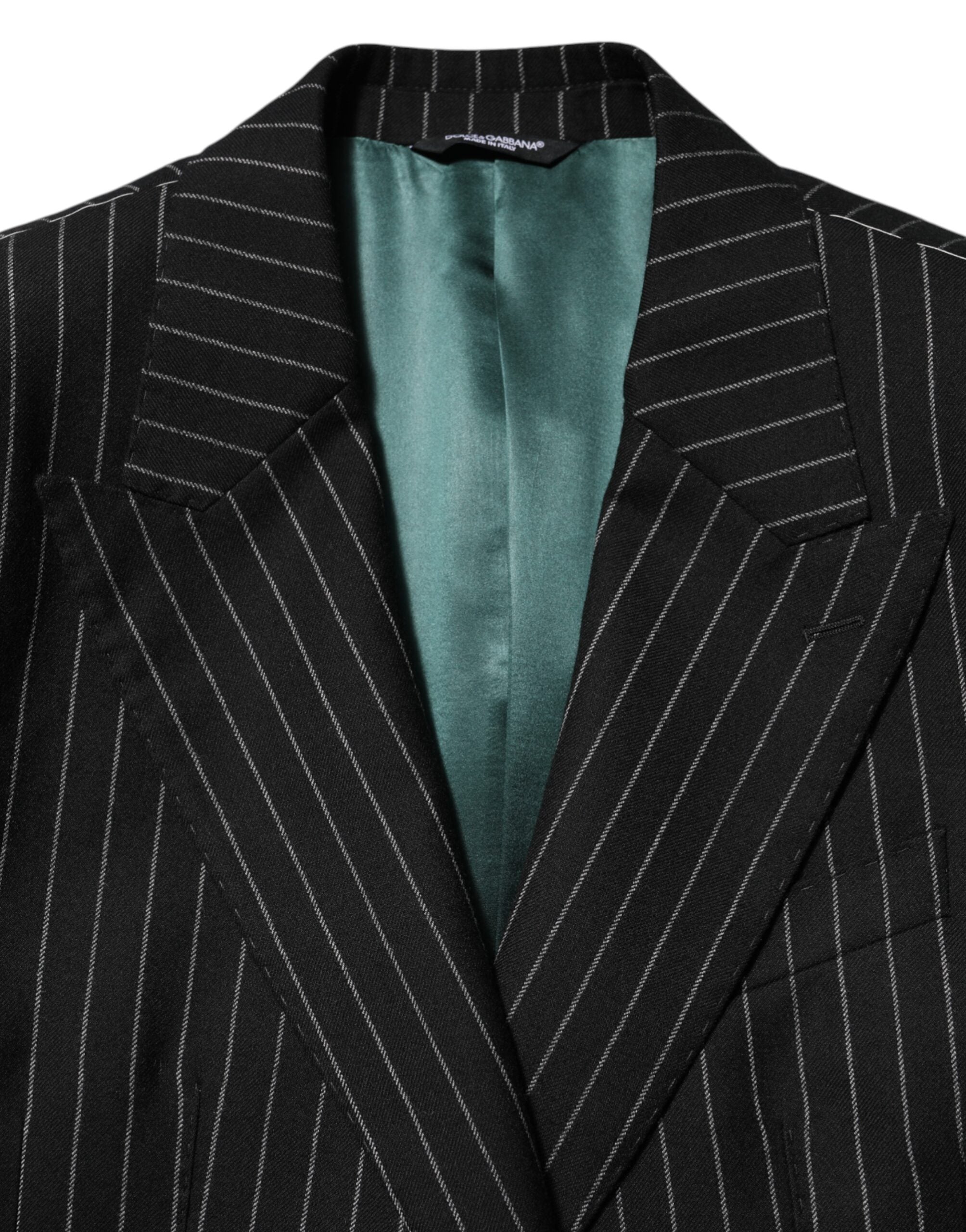 Veste blazer Dolce & Gabbana à rayures noires avec deux boutons, style élégant et tendance.