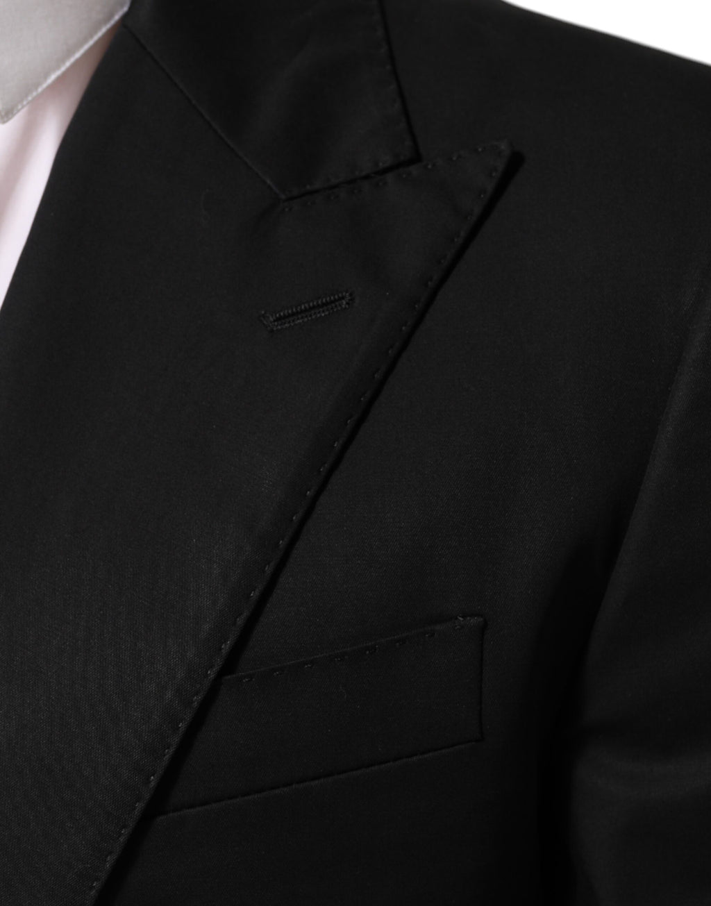 Veste blazer noire en laine Dolce & Gabbana pour homme avec deux boutons, élégante et sophistiquée.