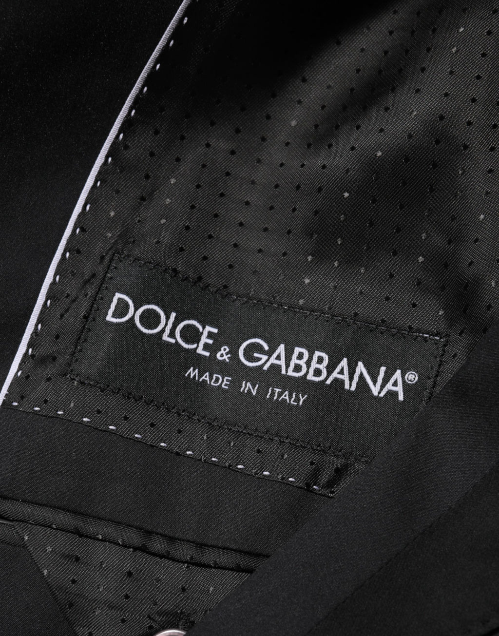 Blazer noir en coton Dolce & Gabbana avec deux boutons, veste élégante pour homme ou femme.