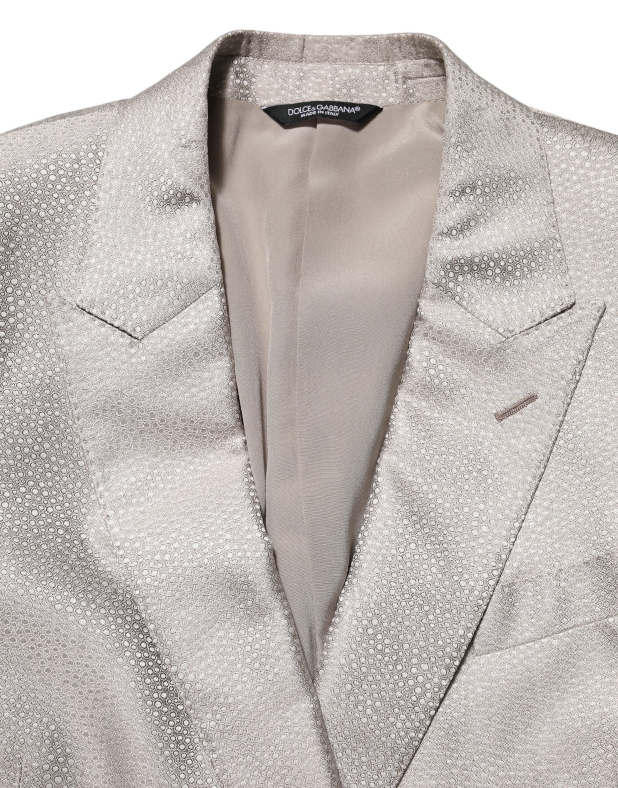 Veste blazer beige à double boutonnage Dolce & Gabbana MARTINI, élégante et sophistiquée, vue de face sur fond neutre.