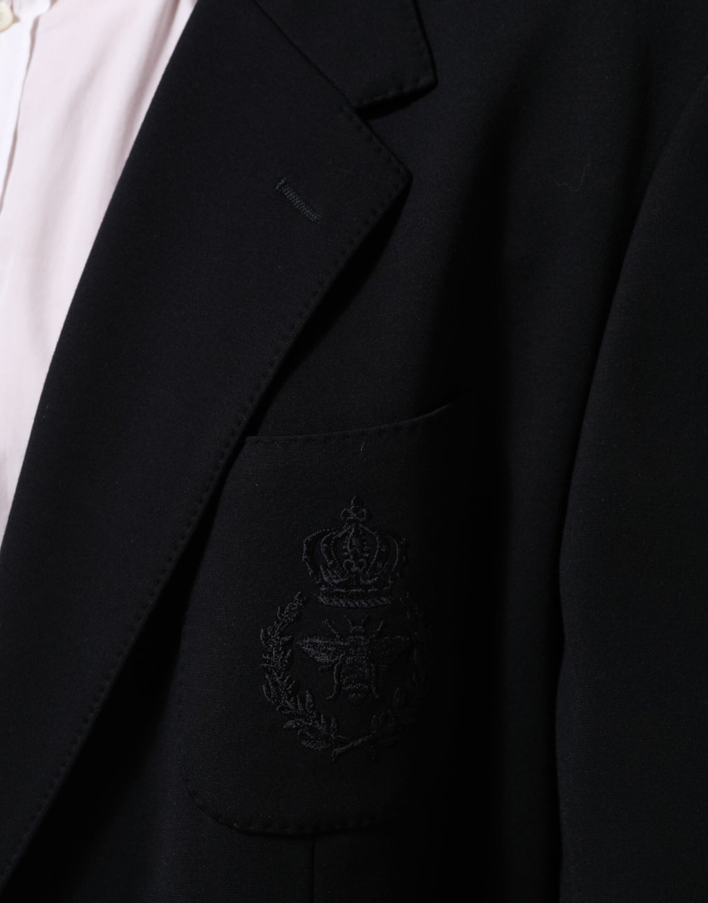 Veste blazer Dolce & Gabbana noire en viscose avec deux boutons, élégante et chic, pour un style sophistiqué.