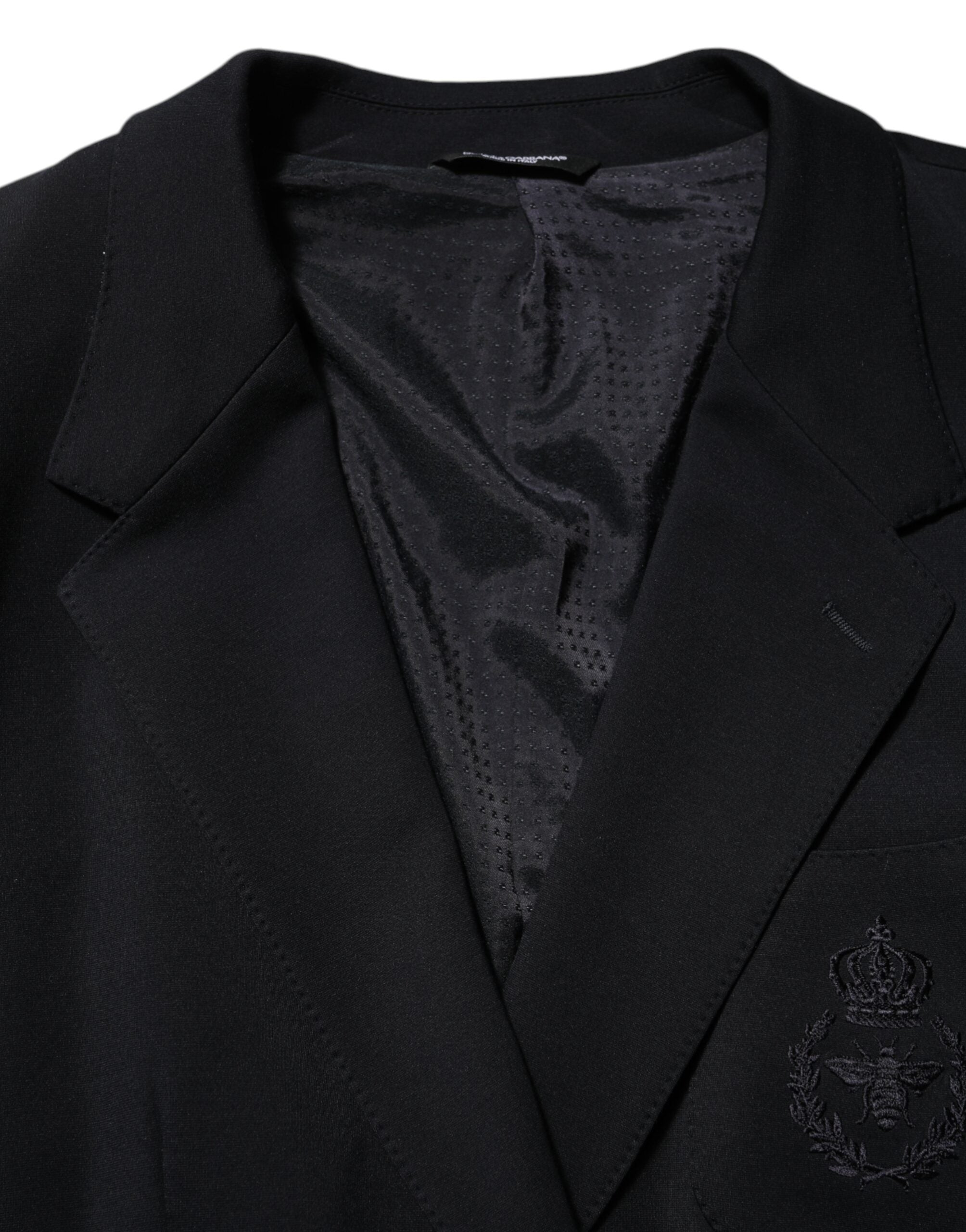 Veste blazer Dolce & Gabbana en viscose noire avec deux boutons, style élégant et moderne, vue de face.