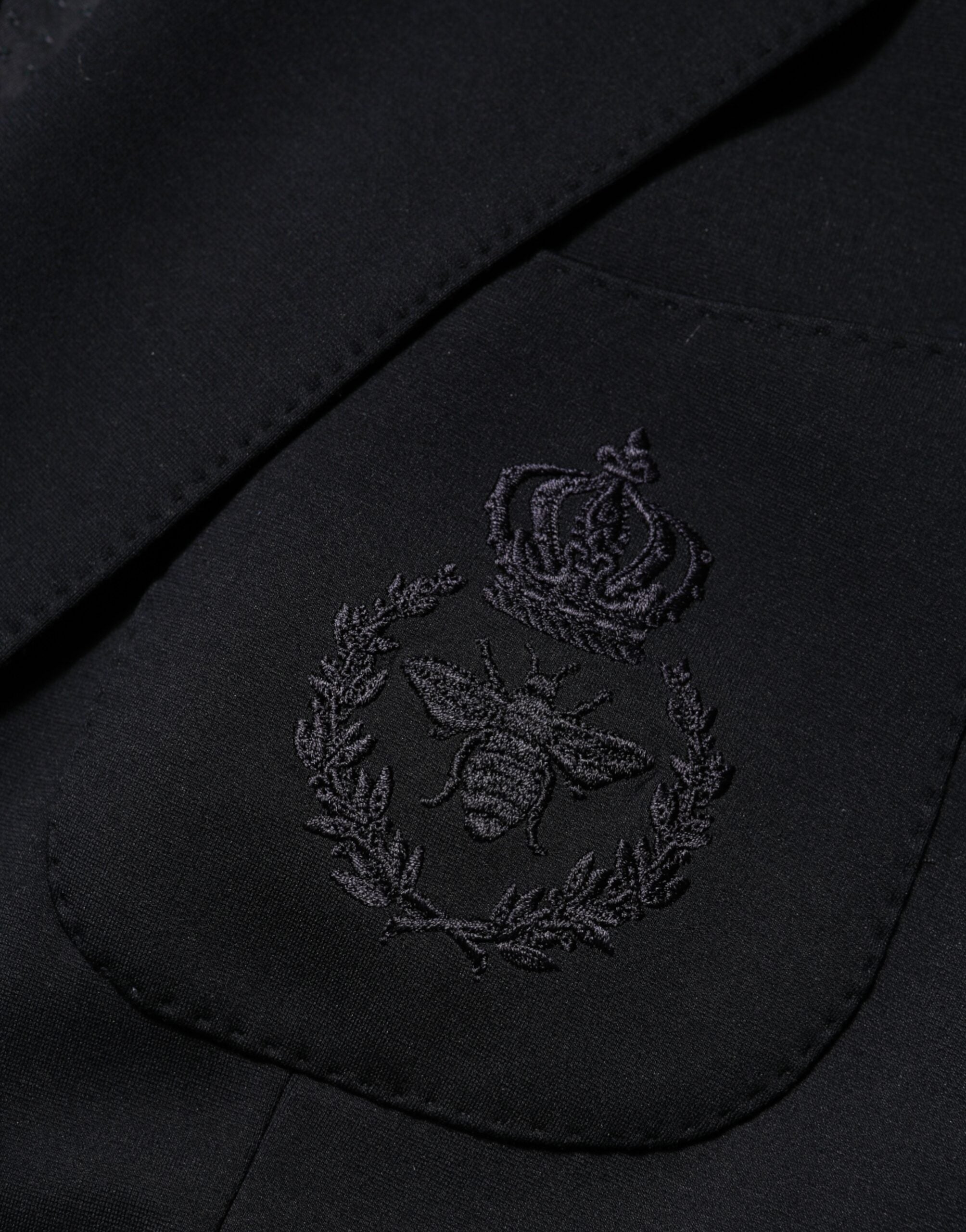 Veste blazer noire Dolce & Gabbana en viscose avec deux boutons, style élégant et moderne pour homme.