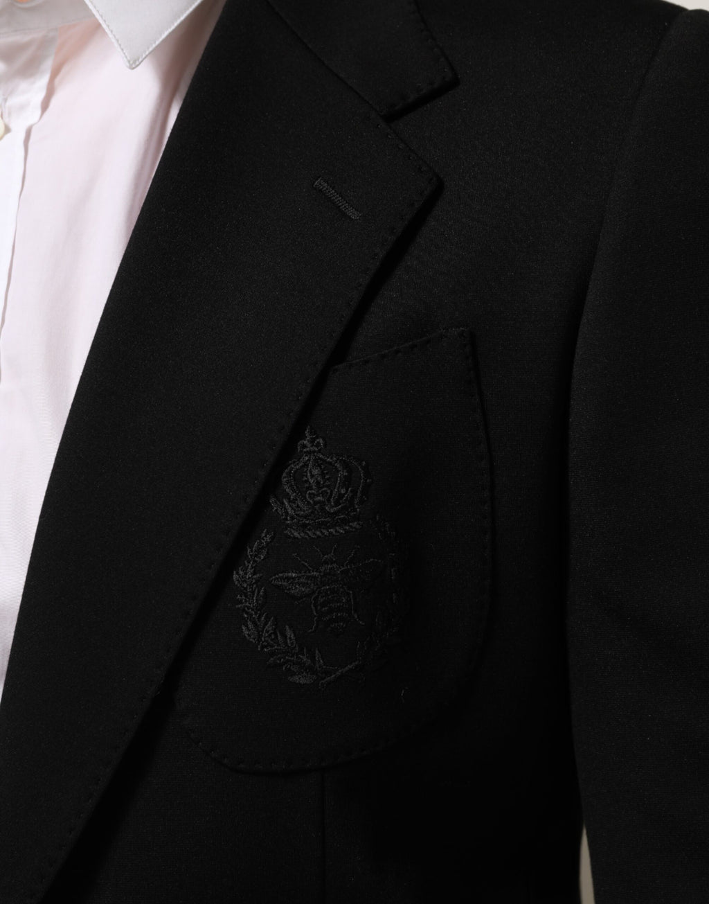 Veste blazer Dolce & Gabbana noire en viscose avec deux boutons, style élégant et ajusté pour homme.