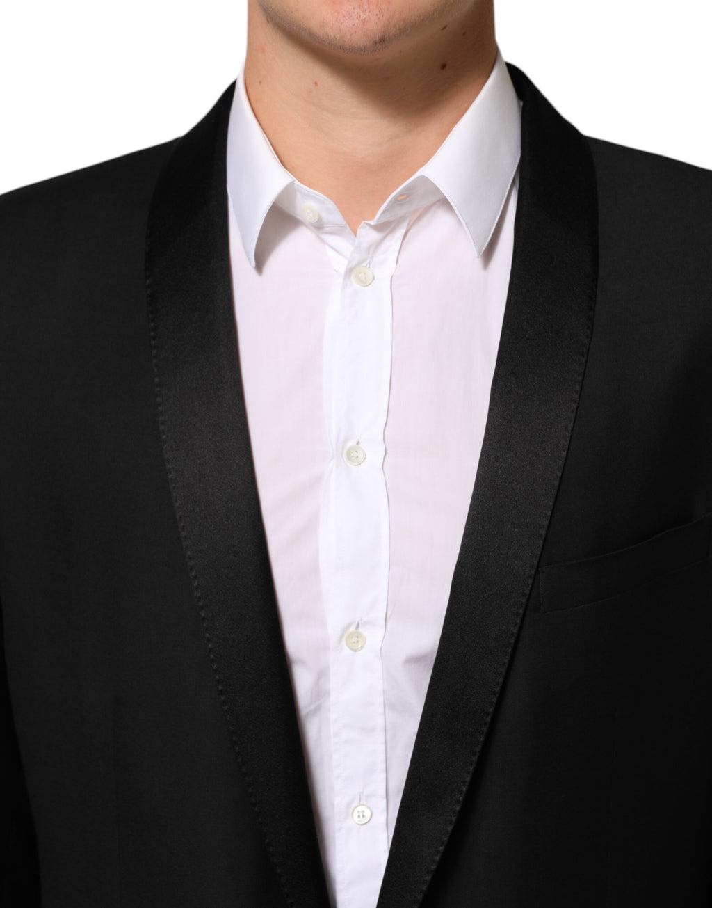 Blazer homme en laine noire Dolce & Gabbana avec un bouton doré, costume élégant et classique.