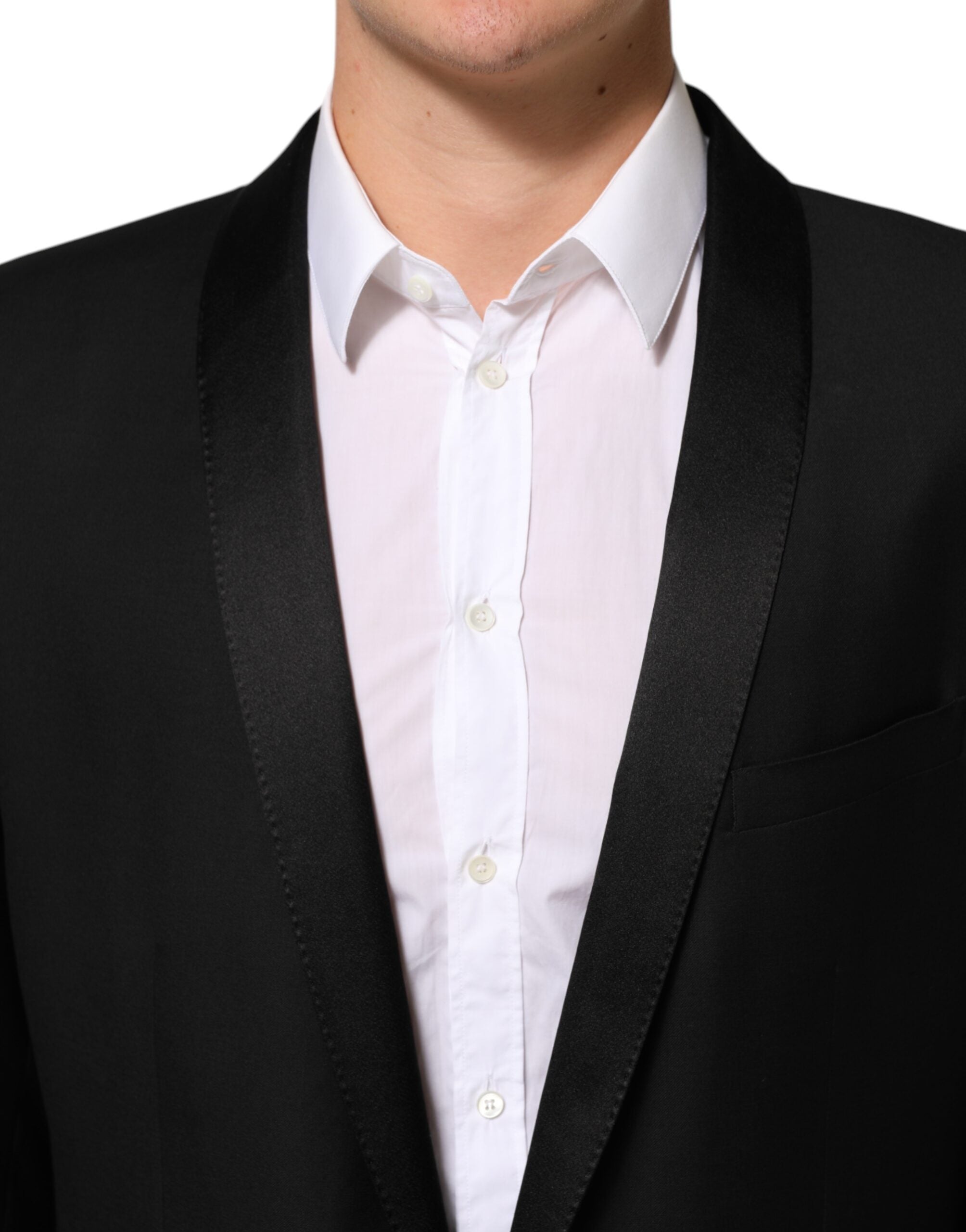Blazer homme en laine noire Dolce & Gabbana avec un bouton doré, costume élégant et classique.