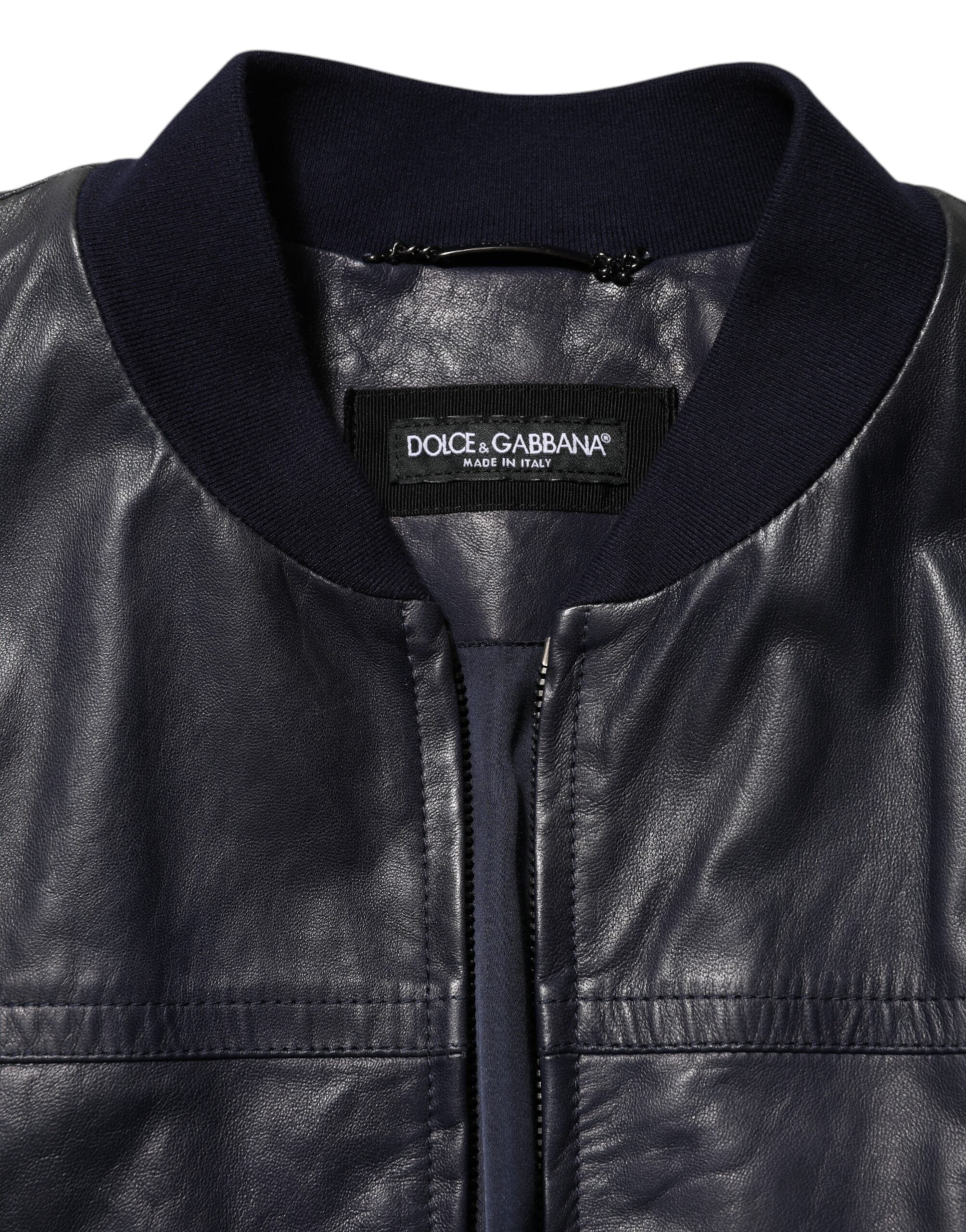 Veste blouson en cuir bleu Dolce & Gabbana à fermeture éclair complète, style biker, avec détails modernes.