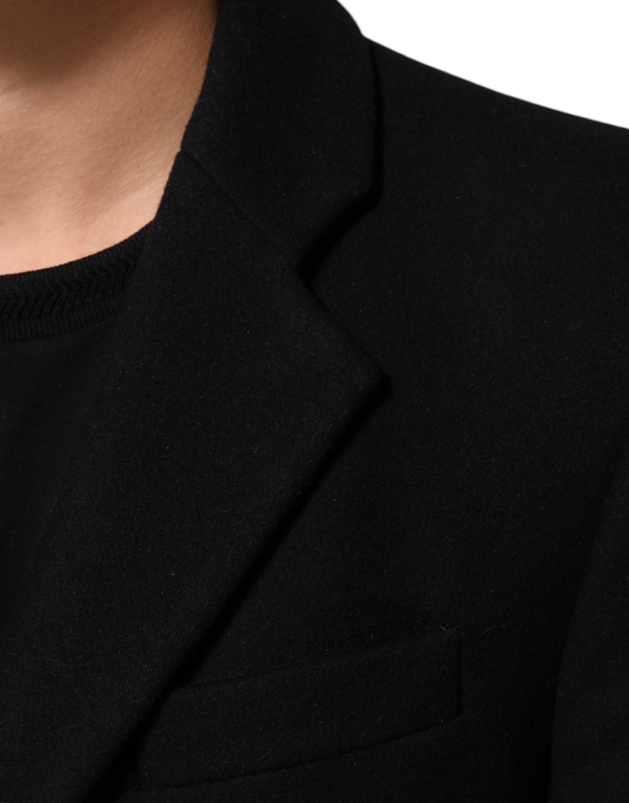 Manteau trench pour homme en laine noire Dolce & Gabbana avec boutons, élégance et style classique visible en image.