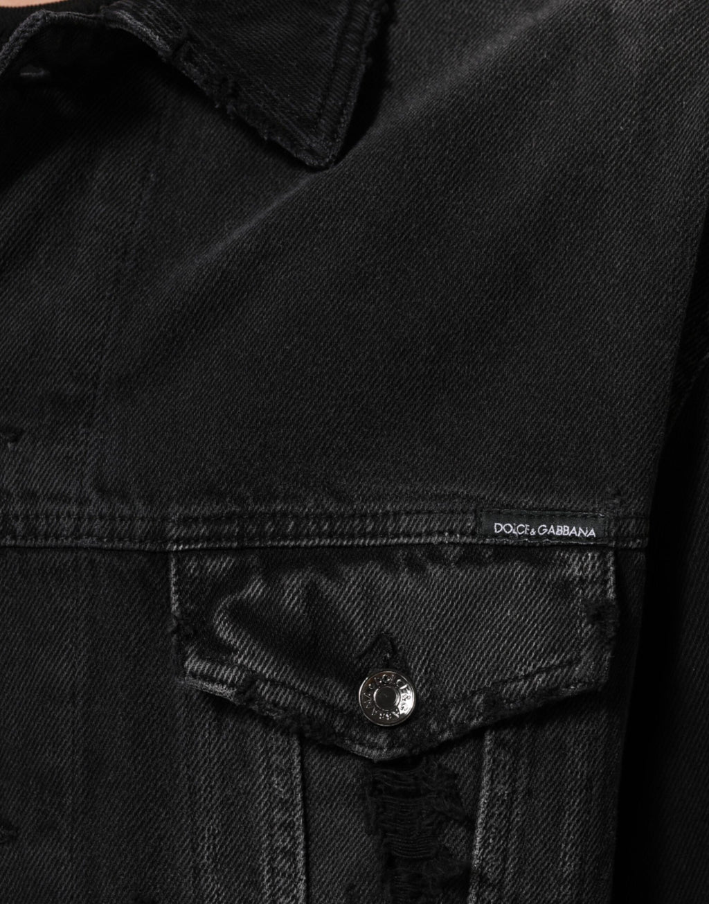 Veste en denim extensible noire en coton de Dolce & Gabbana, blouson élégant avec coupe ajustée et détails modernes.