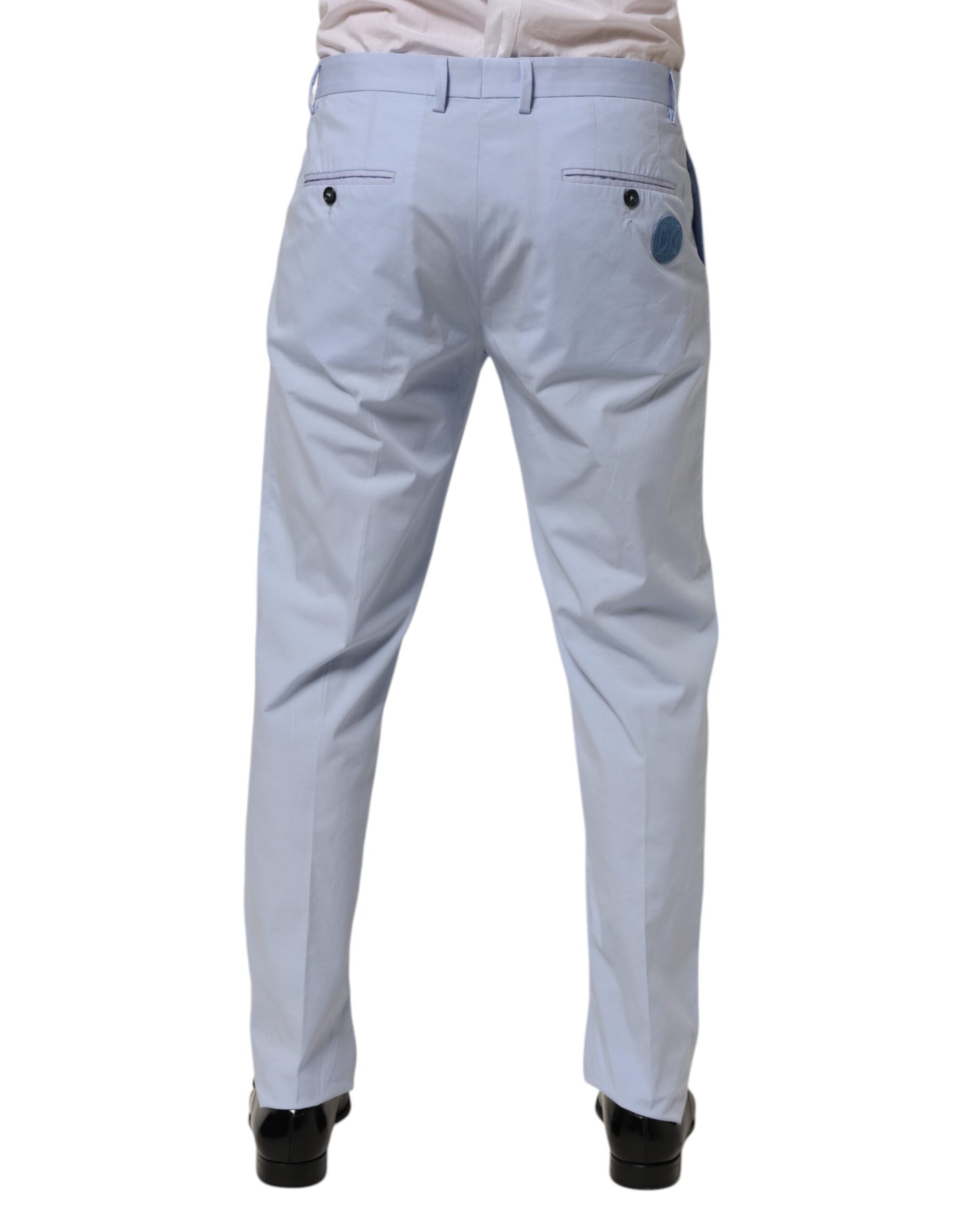 Pantalon homme Dolce & Gabbana Light Blue en coton stretch, coupe tapered, style élégant et confortable.