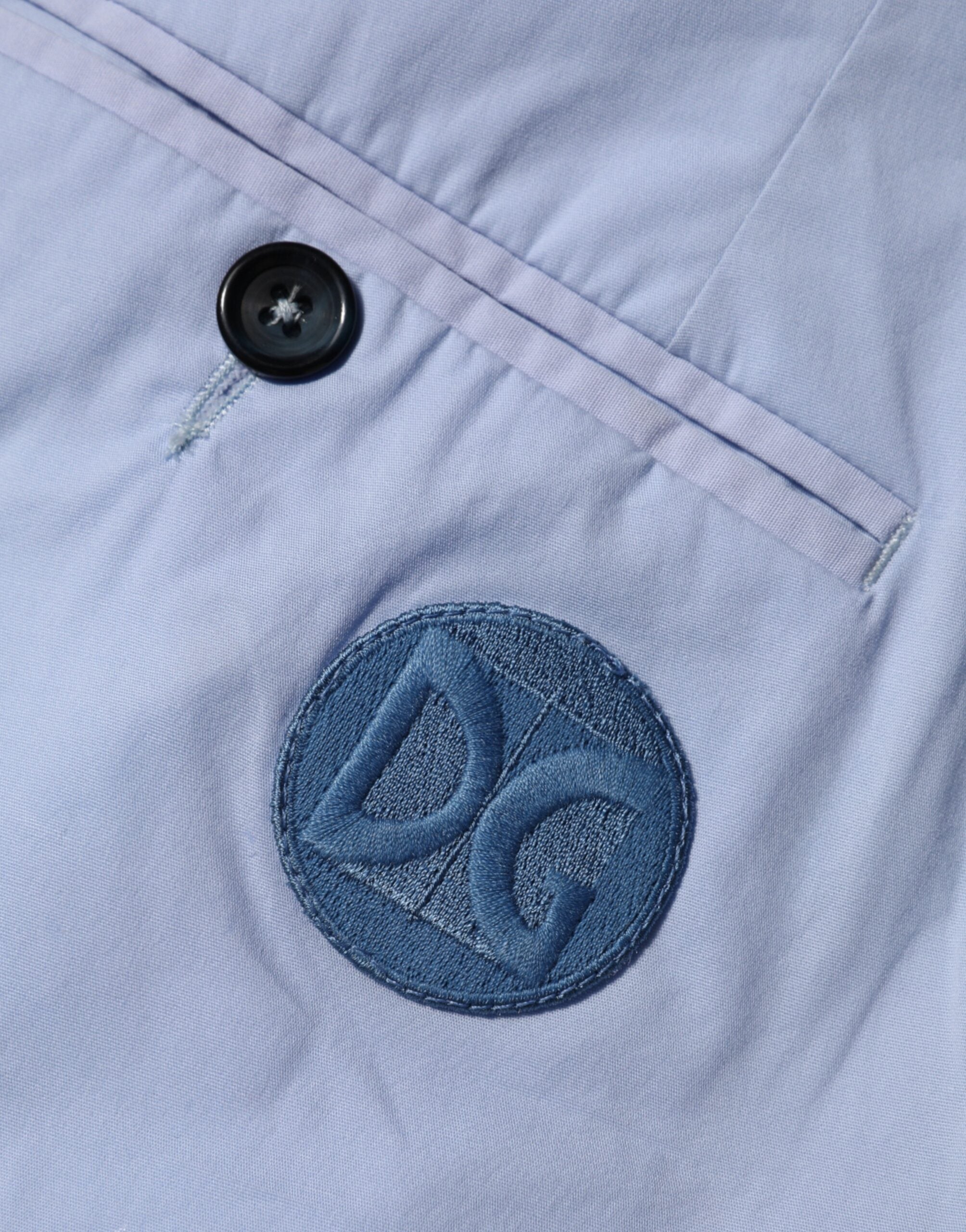 Pantalon pour homme Dolce & Gabbana Light Blue en coton stretch, coupe tapered, élégants et confortables.