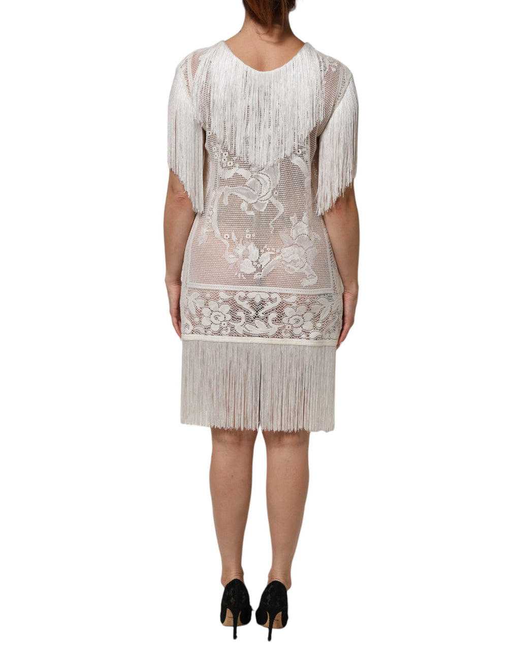 Robe blanche en dentelle florale avec franges, longueur genou, de la marque Dolce & Gabbana.