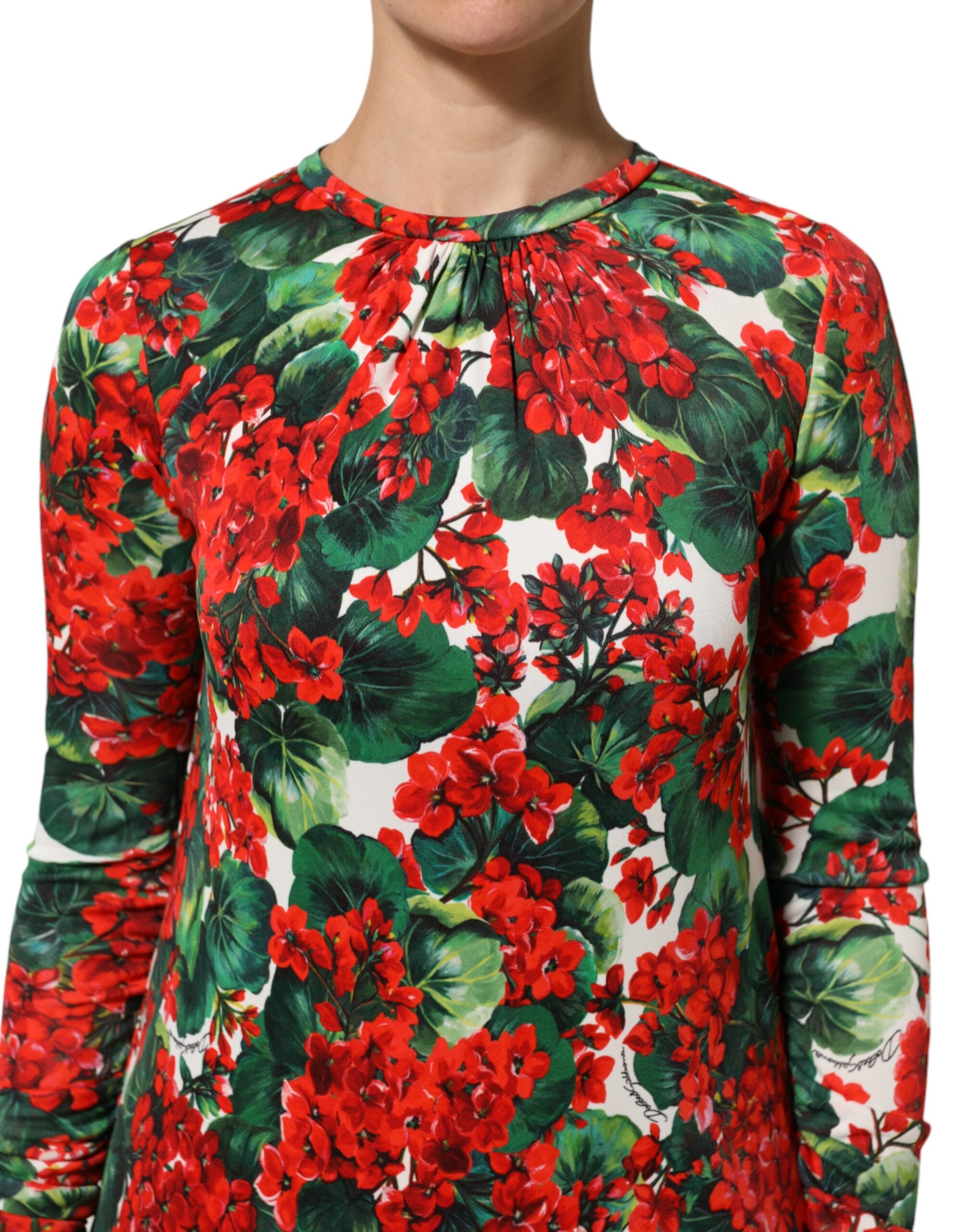 Robe courte Portofino Dolce & Gabbana à fleurs multicolores, avec un design élégant et coloré, parfaite pour une occasion estivale.