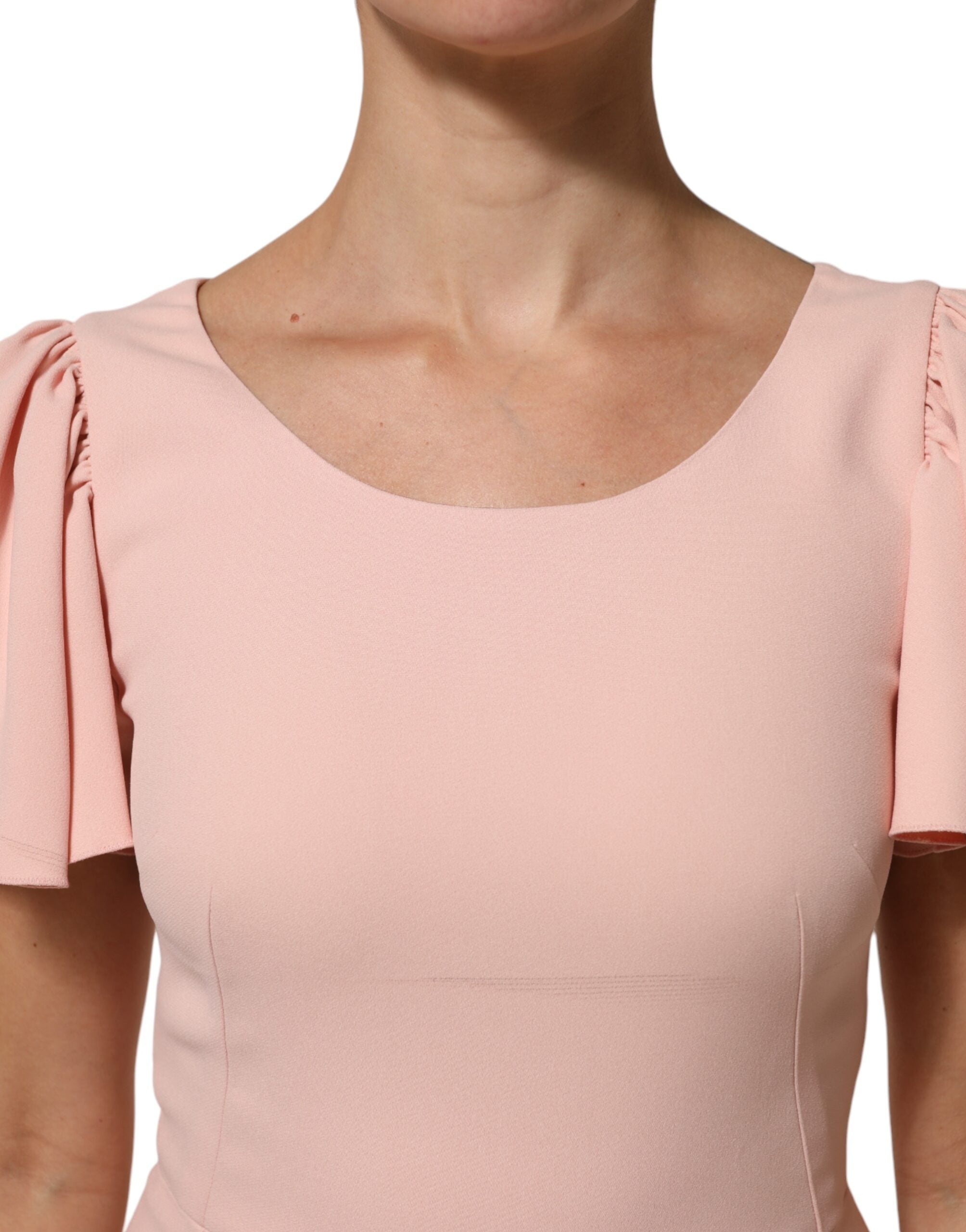 Robe midi évasée en viscose rose de Dolce & Gabbana, coupe ajustée et fluide, élégante et sophistiquée.