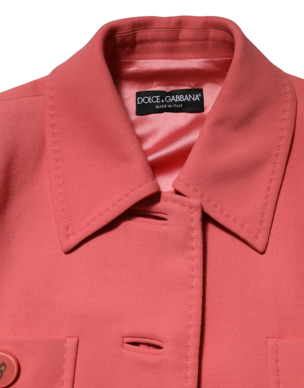 Manteau trench rose Dolce & Gabbana à boutons, manches longues et coupe classique, vue de face.