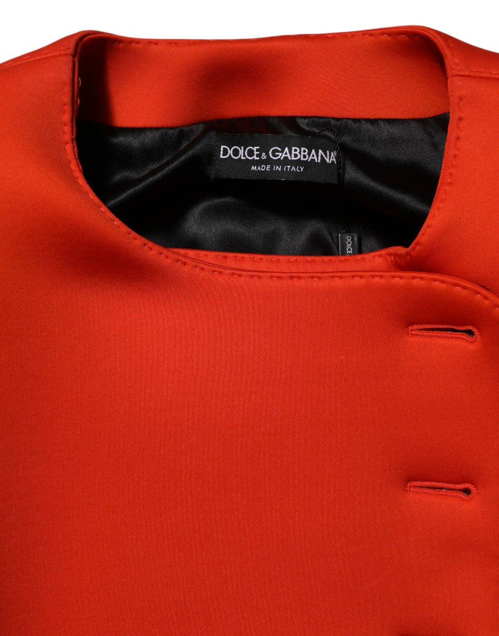 Manteau trench femme rouge Dolce & Gabbana à boutons, élégante veste longue avec ceinture et col classique.
