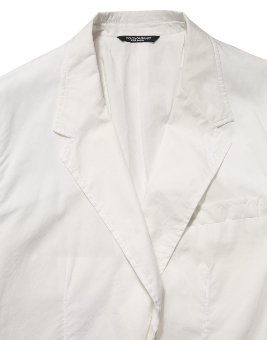 Blazer homme Dolce & Gabbana en coton blanc avec un bouton, style élégant et classique.