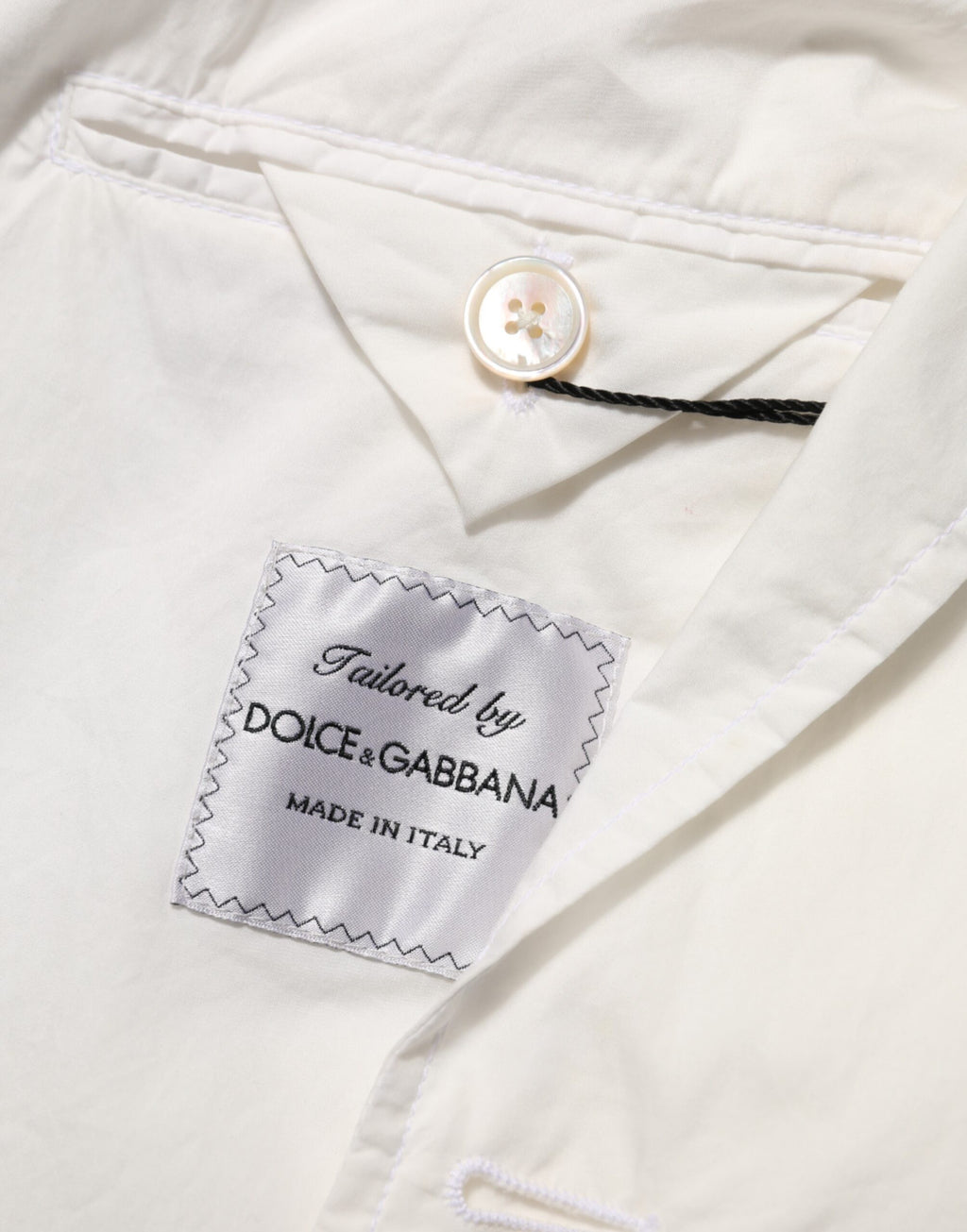 Blazer homme blanc en coton Dolce & Gabbana avec un bouton, costume élégant et moderne.