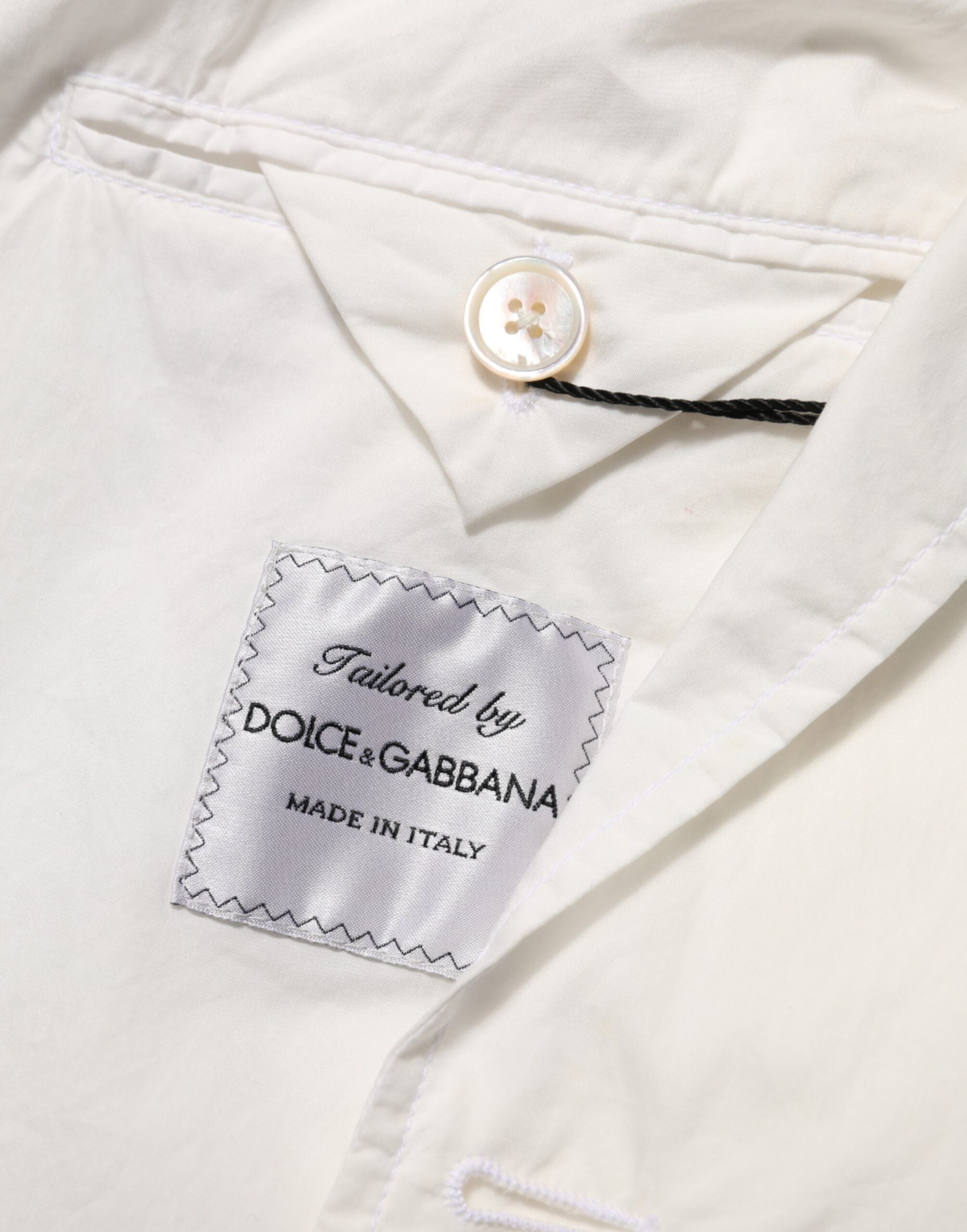 Blazer homme blanc en coton Dolce & Gabbana avec un bouton, costume élégant et moderne.