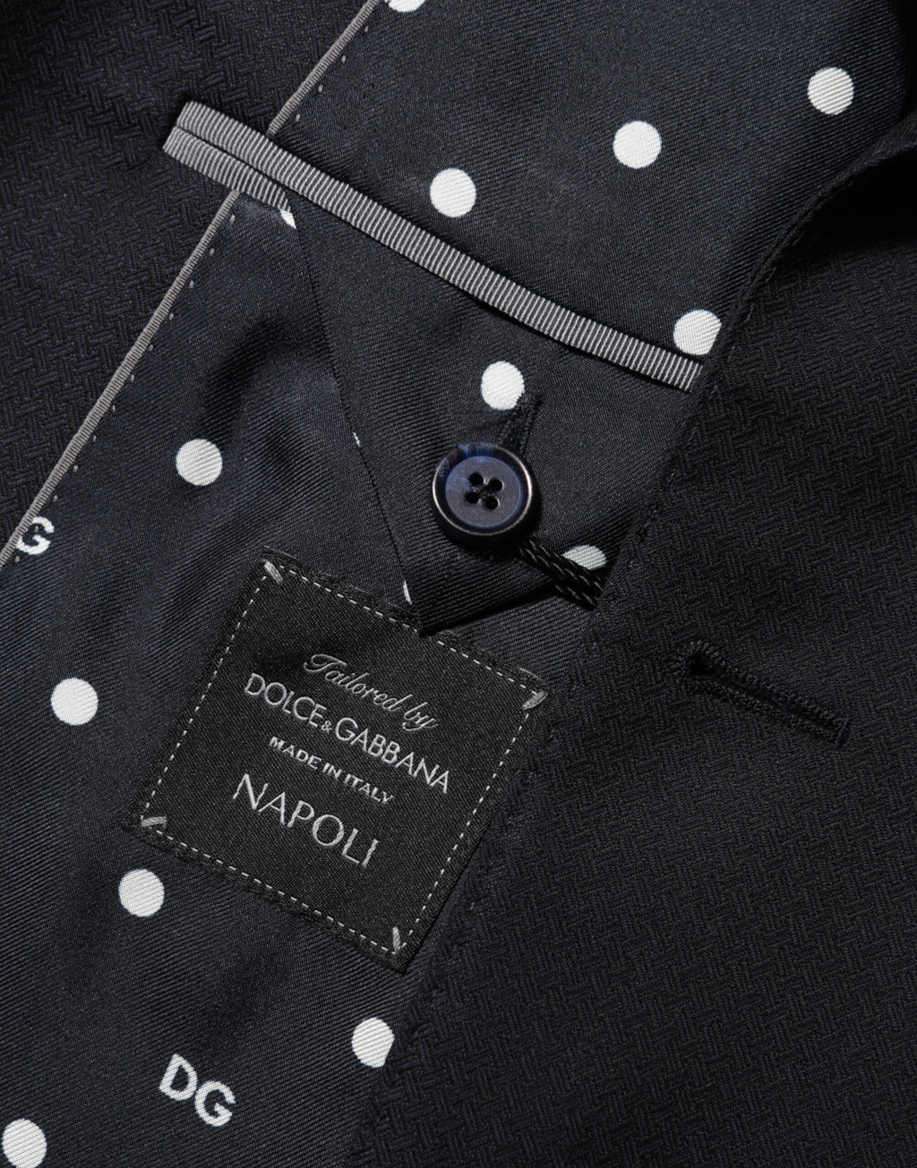 Costume pour homme Dolce & Gabbana en laine noire Napoli avec deux boutons, blazer élégant et sophistiqué.