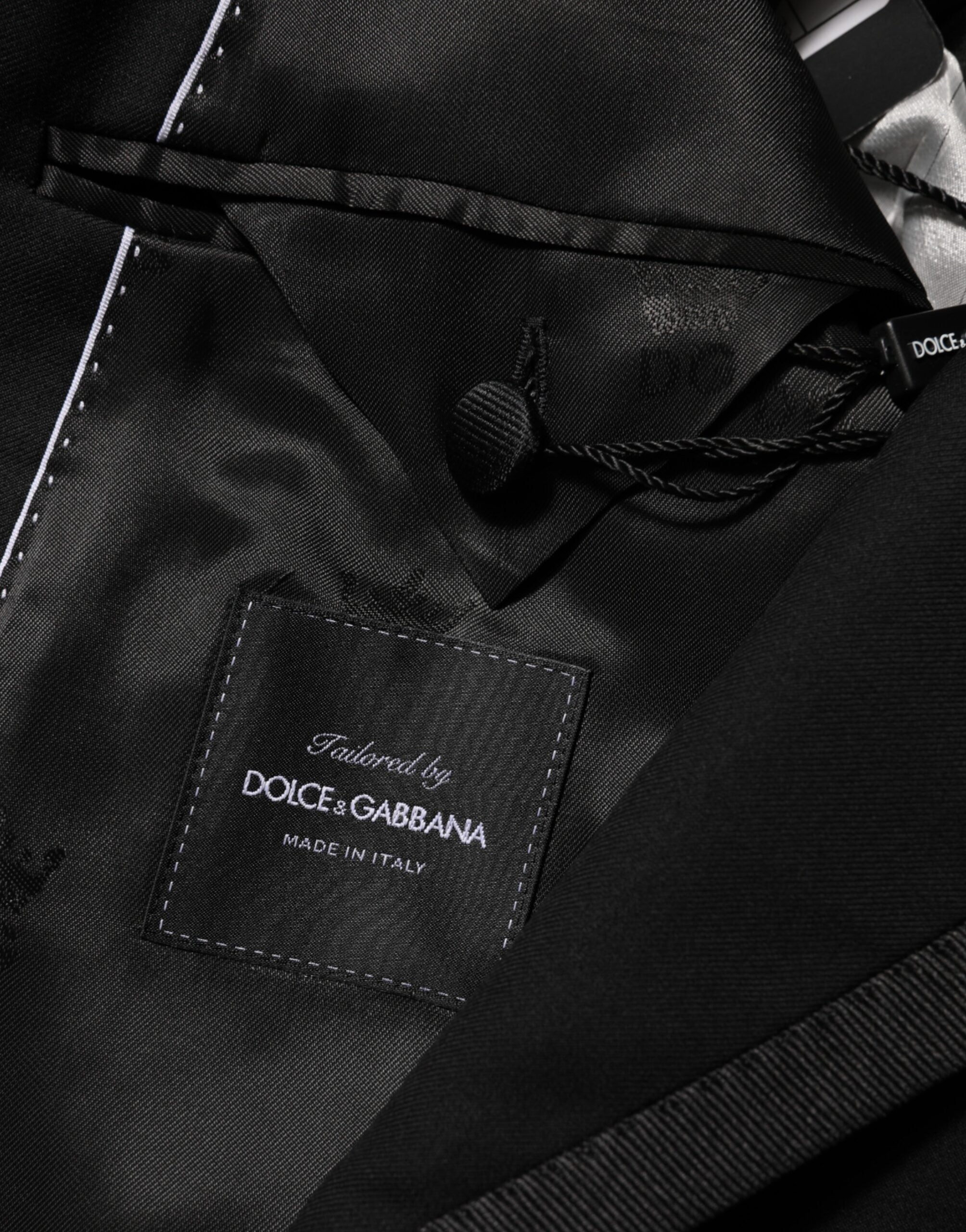 Veste blazer Dolce & Gabbana pour homme en laine noire à un bouton, style élégant et moderne.