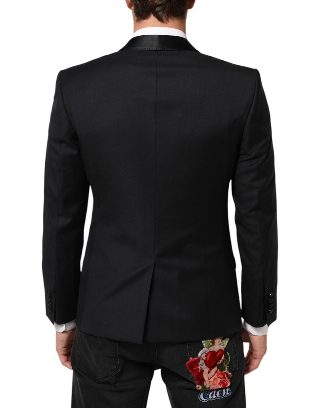 Costume pour homme Dolce & Gabbana en noir avec bouton doré, veste blazer élégante et sophistiquée.
