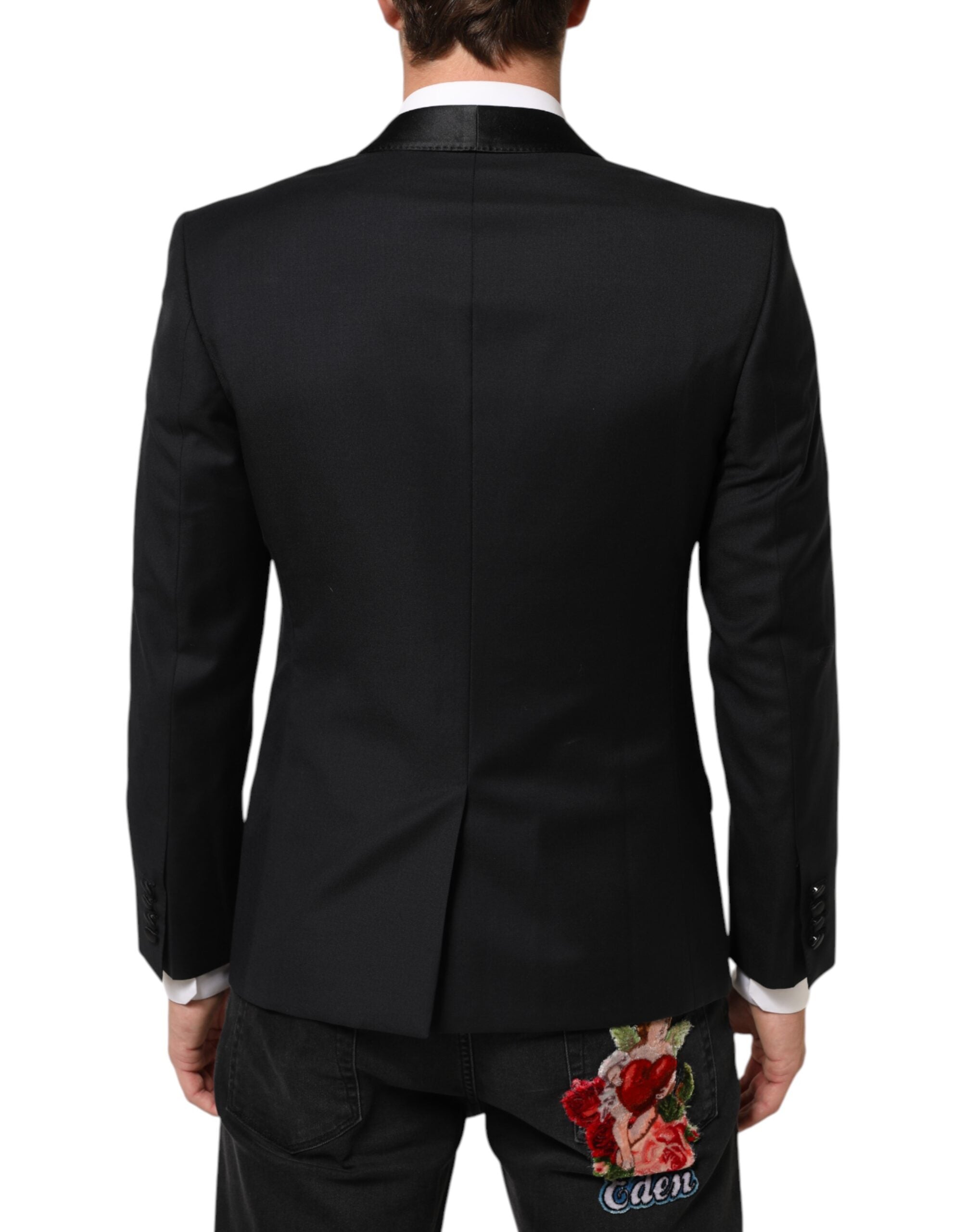 Costume pour homme Dolce & Gabbana en noir avec bouton doré, veste blazer élégante et sophistiquée.