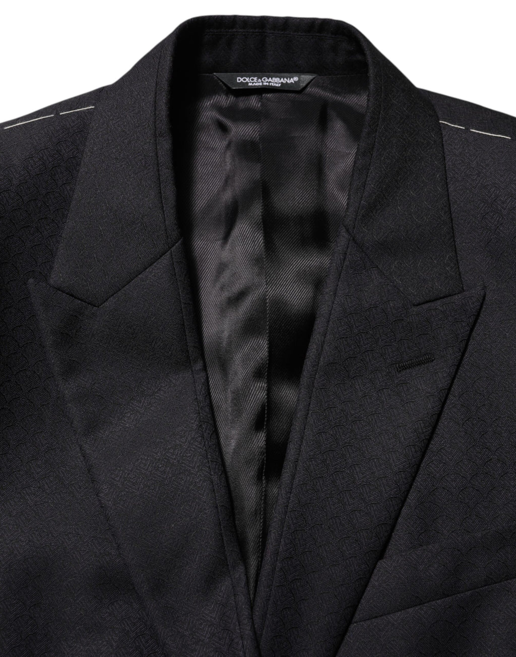 Costume homme Dolce & Gabbana en laine noire avec deux boutons, veste blazer élégante et classique.