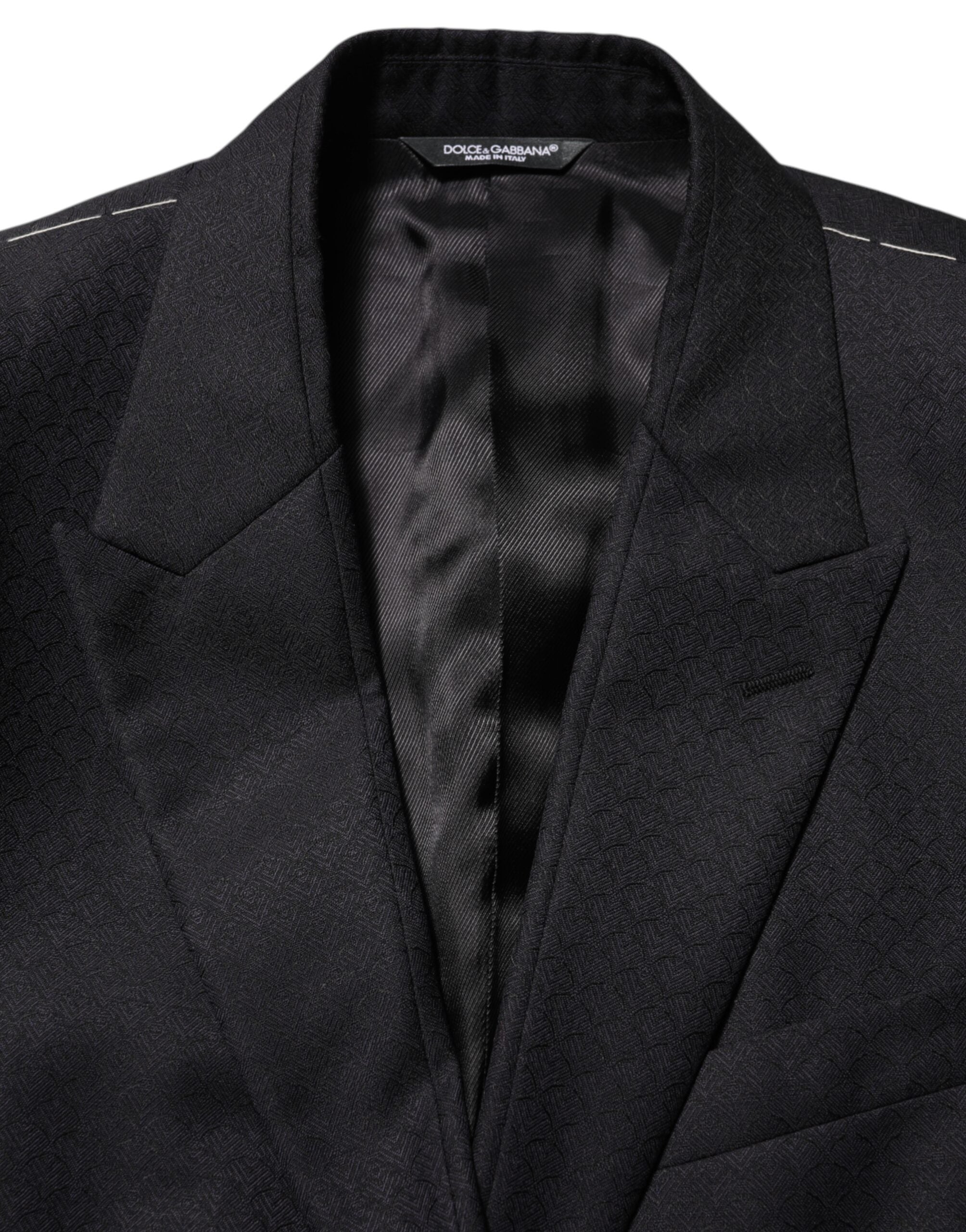 Costume homme Dolce & Gabbana en laine noire avec deux boutons, veste blazer élégante et classique.